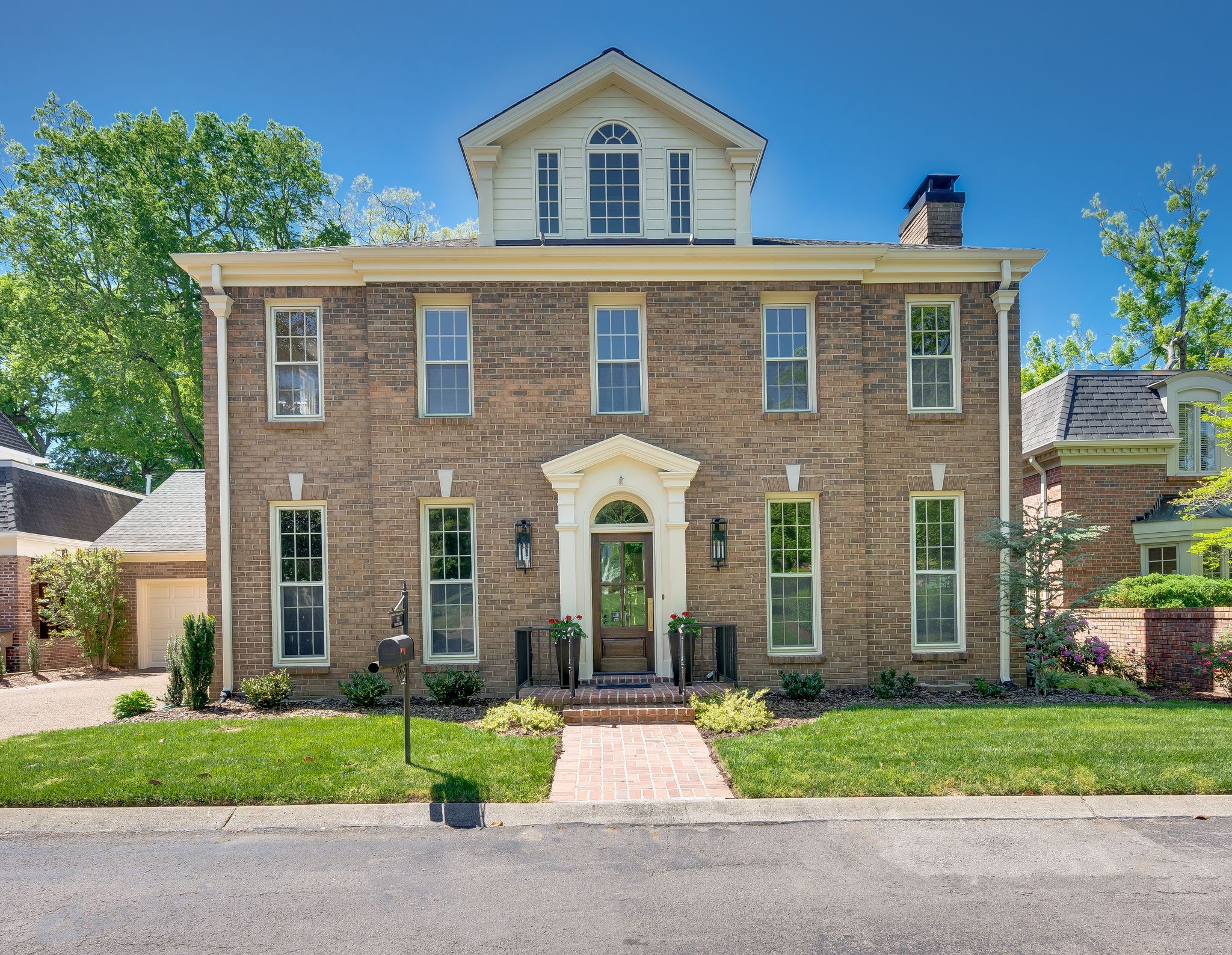 Recently completed exceptional renovation in one of Nashville’s most prestigious gated communities, Sugartree. Tucked away on a quiet, private street backing to Belle Meade, this beautifully updated 4-bedroom, 3.5-bath home offers a rare blend of sophistication, space, and seclusion. The thoughtfully redesigned interior showcases generously sized rooms and high-quality finishes throughout. The third floor provides a versatile bonus space—ideal for a home office, gym, playroom, or a fourth bedroom, perfect for a live-in nanny or returning college student. Additional unfinished storage above the two-car garage adds valuable flexibility. Enjoy the elegance of a charming, basket-weave brick courtyard, which opens to a private green space behind the garage—perfect for a pet, play area, or quiet outdoor retreat. Residents of Sugartree enjoy unparalleled amenities, including tennis and pickleball courts, a saltwater pool, playground, clubhouse, and 16 acres of beautifully maintained common grounds with Level 4 Arboretum certification. HOA-maintained landscaping ensures ease of living, while the community's prime location places you just 5–10 minutes from downtown Nashville, top-tier shopping, hospitals, and schools. This home offers the rare opportunity to enjoy modern renovations and timeless charm in a premium setting—without the hassle of undertaking the updates yourself.