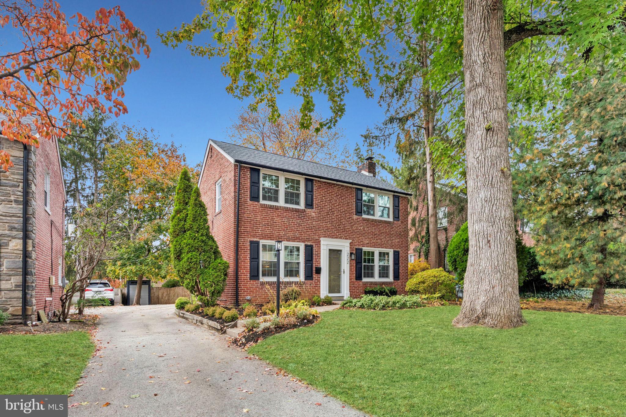 Welcome to this classic brick colonial in desirable Wynnewood—a home that blends timeless charm with modern comfort. Step inside to find beautiful hardwood floors and a spacious living room centered around a cozy wood-burning fireplace, perfect for gathering on cool evenings. A sunny den just off the main living area makes an ideal office or reading nook. The kitchen, with a breakfast bar and open to the dining room, creates an easy flow for everyday living and casual entertaining. A convenient mudroom and pantry combination off the kitchen and leading to the patio adds extra storage and organization.Upstairs, the large primary bedroom offers a walk-in closet and plenty of natural light. Two additional well-sized bedrooms and a hall bath complete the second floor. Need even more space? The finished lower level provides a comfortable bonus area with a powder room—perfect for movie nights, workouts, or playtime. Outside, enjoy the spacious yard and charming brick patio, a lovely spot for morning coffee or evening dinners under the stars. With an attic for ample storage and classic curb appeal in a sought-after neighborhood, this home offers the perfect blend of character, comfort, and convenience.This home has been lovingly improved and maintained. Since purchasing the home in 2021, they have installed a new roof, new furnace and AC, the majority of the windows replaced with Pella double insulated windows, new storm door, updated bathrooms, updated electrical work, exterior work, landscaping, fresh interior paint, gutters, and many more. A pre-listing inspection was also conducted in preparation of this sale and additional repairs were made. Please contact us today for all the specific details. You don't want to miss out on this home.Some photos have been virtually staged.