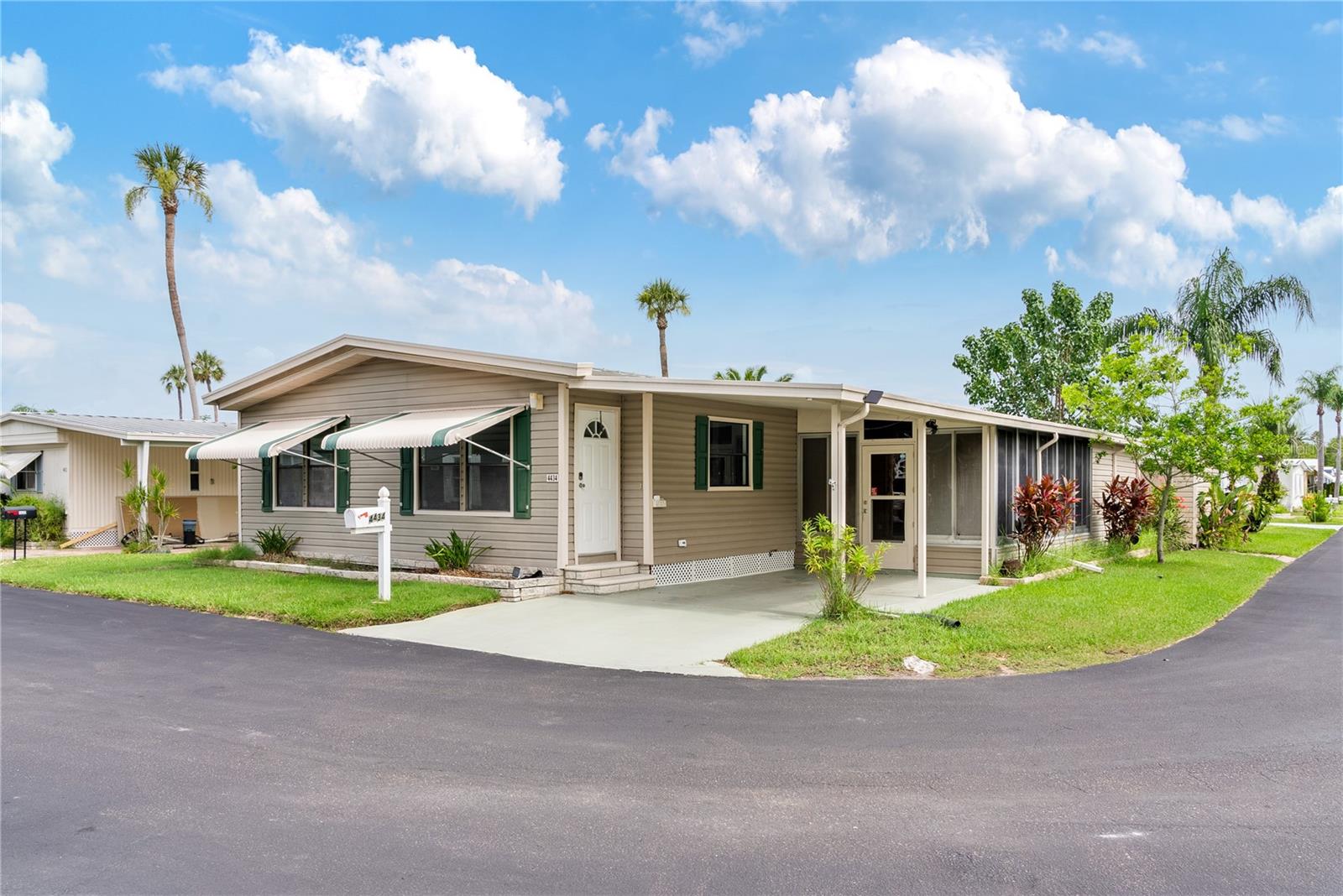 Move-in ready 2-bedroom, 2-bath home on a corner lot offering a blend of comfort and style. Enjoy brand-new flooring, updated appliances including adishwasher, disposal, washer & dryer, and fresh drywall throughout. The bright bonus room features hurricane-impact windows and a newer AC mini-split system for year-round comfort. Interior highlights include custom solid wood cabinetry, Mediterranean-inspired bathroom tile, and sleek ceramic finishes. Step outside to a private patio, perfect for relaxing or entertaining. Additional features include a water conditioning system and a low HOA fee of just $175 month. The community offers a heated pool and clubhouse, with HOA dues covering trash service, grounds maintenance, cable TV, internet, and phone.