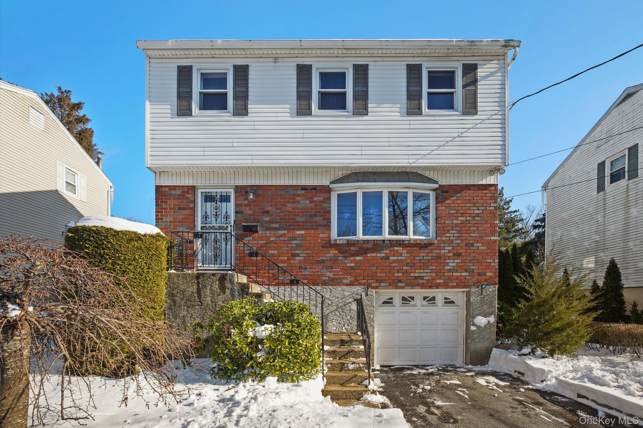 ON MARKET for the FIRST TIME in 50 YEARS - 192 Helena Ave Yonkers NY - sweet 3 Bed, 1 1/2 bath colonial on quiet street, well loved by family who dressed it to the nines, is ready for new owners! Recent upgrades include newly RENOVATED bathrooms, NEW hot water heater, young AC compressor, FRESHLY painted 660 sq ft finished recreation room in basement not included in sq footage. The first floor offers a gracious foyer & front closet, large living room with big picture windows open to dining area. The powder room is ready for its close up and and the eat-in kitchen is ready for your updates. Upstairs is a huge primary bedroom with plenty of closets, two more bedrooms, a luxurious full bath and hardwood floors as shown. Central AC, and central vacuum make for an easy & breezy lifestyle. Out back is a HUGE 450 sq ft Trex deck built in 2020, overlooking a great backyard. Start planning your summer entertaining now! Just around the corner from Central Ave shopping and conveniences, less than 1 mi. to Glenwood Metro North Train Station, 40 minutes to Grand Central. Bring your contractor and your vision, and make it your own!