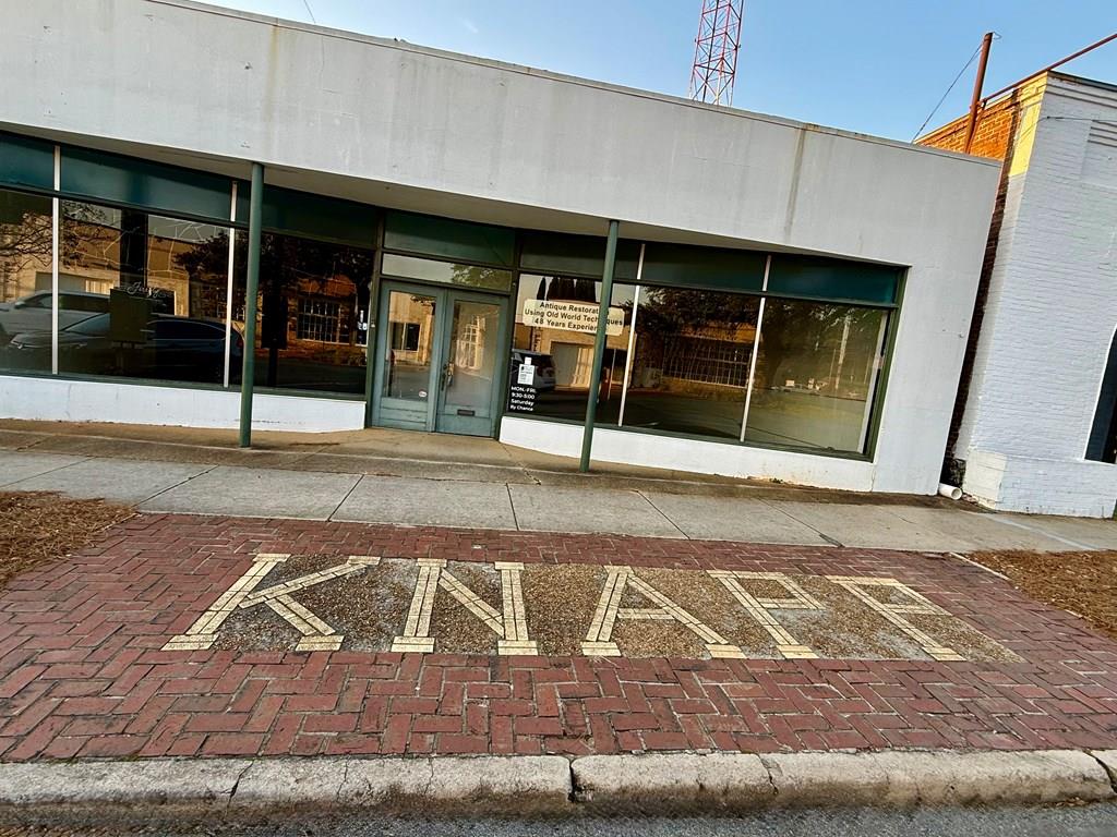 Rare commercial space available in the downtown area. Better known as the old Knapp Hardware & Locksmith building. Approximately 4800 ft. total, with a double-entry storefront, so it could be split for two businesses. Buy it and lease out the other side for additional income . About 3600 ft. downstairs and 1200 ft. upstairs. It's just waiting for a new business to open in this prime location. It boasts  12-foot ceilings and spacious storefront windows. It would be perfect for a restaurant, bar, or any retail space. So, if you're thinking about growing your business or starting something new, this is a fantastic opportunity. You won't want to miss it. It's not often you find something like this in the downtown area. The seller has also acquired some additional green space in the building's rear, which was originally planned for an outdoor space for a restaurant. The seller also has plans that could be included with the building's sale if you're interested. This building is truly a unique staple to downtown Thomasville.  CALL TODAY TO SEE THIS PROPERTY.