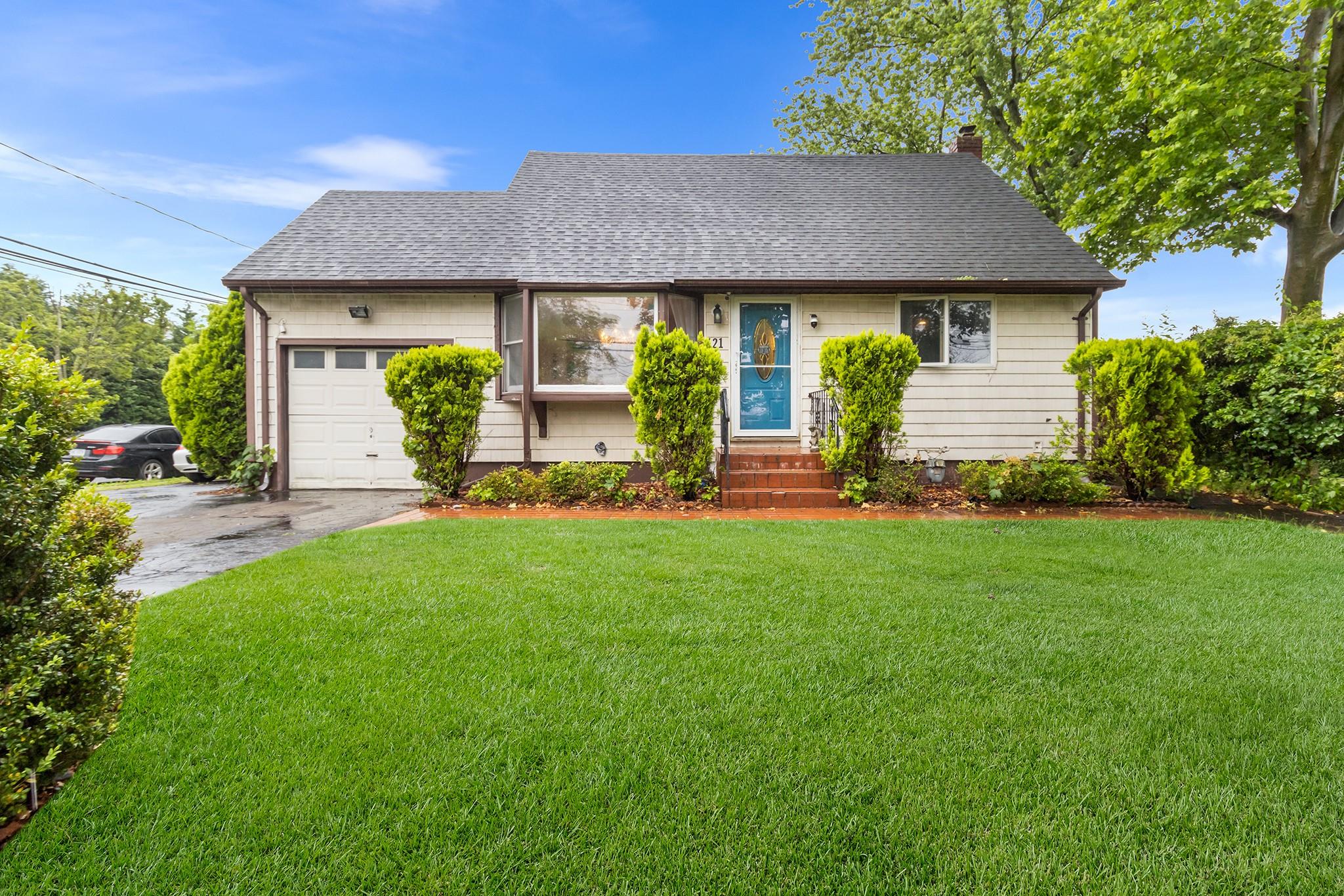 Welcome to 121 Thomas Avenue—a charming Cape Cod-style home set on a quiet street in the desirable Central Park section of Bethpage. This 3-bedroom, 2-bath home features classic aluminum/vinyl siding, a wide driveway, and attached partially converted garage offering ample storage. Inside, you'll find a warm and inviting layout with a bright living room, a formal dining area, and an eat-in kitchen perfect for cozy meals. The main floor includes one bedroom and a full bathroom, while upstairs offers two additional bedrooms and another full bath. A versatile office provides remote work options, and the full basement adds abundant storage or potential bonus space. Outside, enjoy a private, fenced-in backyard with a deck ideal for relaxing or hosting. This home includes wall A/C units, natural gas heating with radiators, and public water and sewer services. Located in the Bethpage School District, this home is just minutes from the Bethpage LIRR station, Route 135, the LIE, and both the Northern and Southern State Parkways—offering easy access to NYC and all of Long Island