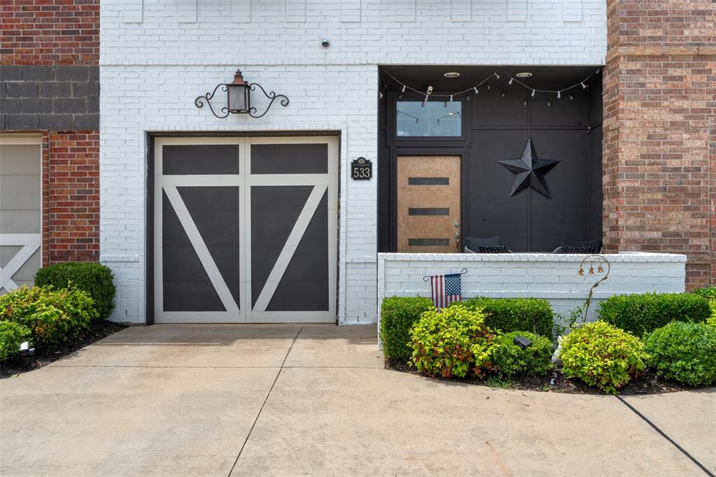 Nestled in the heart of the city, this contemporary townhome offers urban living with all of the local convenience's.  Walk to Farmer's market, Art district and eating places. This 2-level townhome is warm & inviting. Cute front porch area to sit out and sip your coffee.
The interior is designed with an open floor plan on the main level with the kitchen, living, and eating area all easily accessible. The flooring downstairs is stamped and scored concrete and very durable. Granite Kitchen counters and stylish lighting. The outdoor patio has room to grill or just hanging out on. There is also a half bath downstairs. The industrial feel is also on the wrought iron handrail that runs upstairs. Large master bedroom has plenty of room for your large bed and furniture. Two additional bedrooms upstairs with guest bathroom.  The laundry area also upstirs. The complex is very nice with a central gazebo & dog park. Must see if you have been wanting to be close to it all.