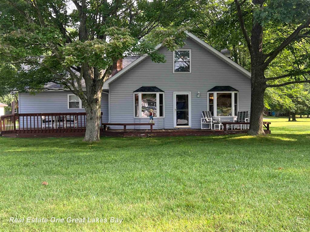Here's your perfect getaway. Walk out the door and enjoy Lake James and all the fun things the water brings, In the evening sit around the firepit and savor the peace and tranquility. The home is move in ready, with furniture and appliances included in the price. There's lots of room to enjoy. The 1494 Sq Ft. does not include the large laundry room and entry area. The 2.5 detached garage has a 10FT door. Above the garage is a large 26x14 area which has been insulated, has electrical installed and has been plumbed for a bathroom, Area just need to be finished off. Sink and toilet are there, just need to be installed. Garage has a separate furnace from the house. The home has been updated. AC is 2 years old. The outdoor area has 73 feet on Lake James including a small beach area with a removable aluminum dock. As well as a few different areas to relax. Don't miss out on your chance to own this little piece of heaven.