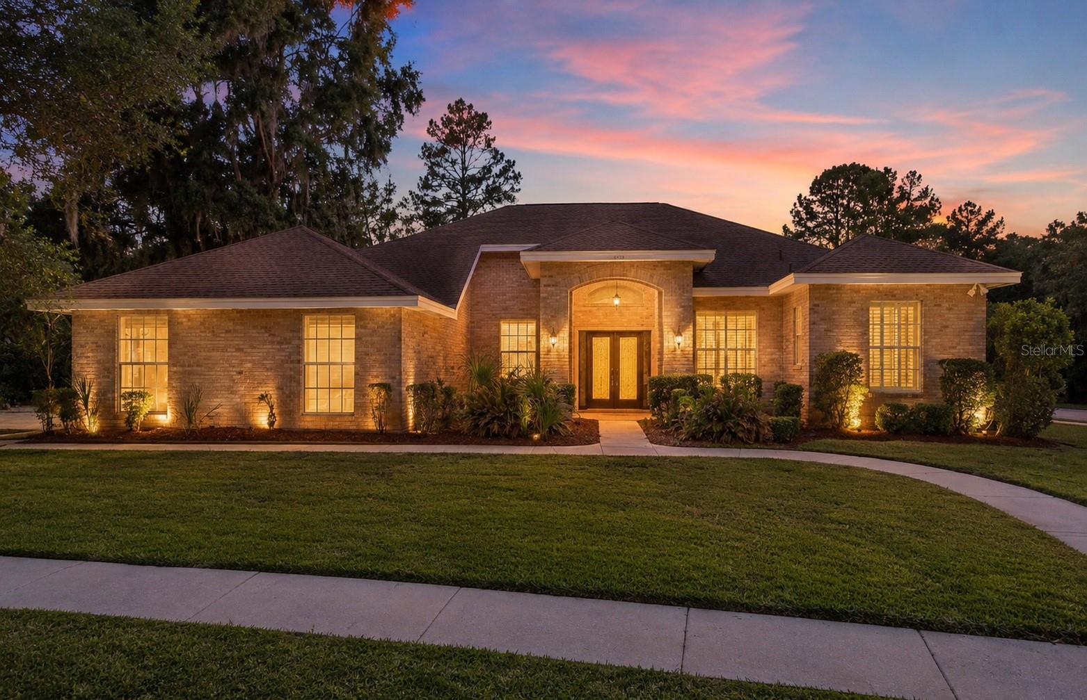 JUST REDUCED 45,000 · GUARD GATED · CUL-DE-SAC · STEPS TO THE WEEKI WACHEE RIVER · 5 BEDROOMS · HEATED SALTWATER POOL · 3-CAR GARAGE · THIS LOCATION DOES NOT EXIST ANYWHERE ELSE.Just reduced to 750,000. Same incredible home. 45,000 less. Let's talk about where this home sits because there is nothing else like it. Behind a GUARDED GATE. All the way to the back of an exclusive estate community. On a CORNER LOT at the end of a CUL-DE-SAC. And a 3-minute walk from your backyard is a PRIVATE COMMUNITY PARK with DIRECT RIVER ACCESS to the WORLD FAMOUS WEEKI WACHEE RIVER. Kayaks. Paddleboards. Snorkeling in one of Florida's most iconic natural springs. This is the kind of river access people spend years searching for and never find. Tennis, Basketball, and Pickleball Courts round out the community amenities -- but let's be honest, the river is the star. Now let's talk about the home. CEDAR WOOD SIDING. BRICK FRONT. GRAND DOUBLE LED GLASS ENTRY. This one turns heads before you even pull into the 3-CAR SIDE-ENTRY GARAGE. Inside, GRAND COLUMNS frame the FORMAL LIVING and DINING AREAS with HARDWOOD FLOORS and TRIPLE SLIDING GLASS DOORS overlooking the pool. A private HOME OFFICE with BUILT-INS and WAINSCOTING sits behind DOUBLE GLASS DOORS. Work from home never looked this good. The FAMILY ROOM is something you have to see in person. SOARING CEILINGS. FLOOR-TO-CEILING WINDOWS flooding the space with natural light. WET BAR. ELECTRIC FIREPLACE. This is the room people walk into and don't want to leave. It feels like a grand ballroom and it lives like one too. The RENOVATED KITCHEN features STUNNING GRANITE COUNTERTOPS, a COOKTOP and WALL OVEN, and NEW APPLIANCES. The PRIMARY SUITE has HIS AND HERS WALK-IN CLOSETS and a spa-like bathroom with a SOAKING TUB and WALK-IN SHOWER. The SPLIT BEDROOM PLAN offers two guest rooms with a shared bath plus a completely PRIVATE GUEST SUITE at the rear of the home. Step outside and you will not want to come back in. TONGUE AND GROOVE CEDAR CEILING over freshly sealed BRICK PAVER DECKING. HEATED SALTWATER POOL AND SPA with an IN-FLOOR CLEANING SYSTEM. OUTDOOR KITCHEN with a NEW JENN-AIR GRILL. OUTDOOR SHOWER with hot and cold water. This is the backyard people dream about. NEW ROOF 2017. NEWER HOT WATER HEATER. NEWER POOL PUMP AND FILTER. IRRIGATION WELL. NO FLOOD ZONE. NO CDD. 3,493 SF OF LIVING SPACE. 4,923 SF UNDER ROOF. On 0.61 ACRES. 750,000. Guard gated. River access. 45,000 just came off the price.