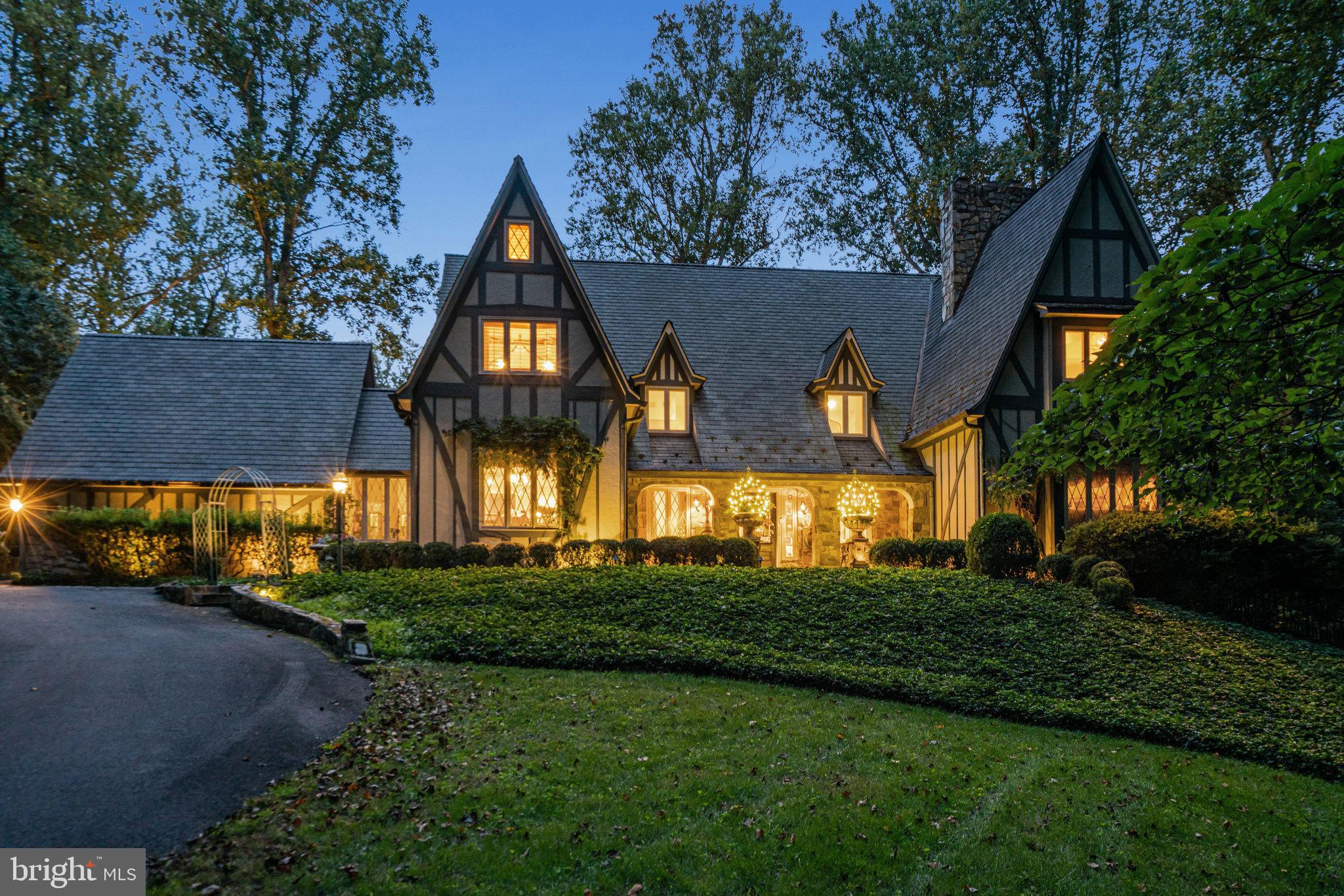 10205 Cedar Pond Drive is where the Fairy Tale Begins.  HIDDEN OASIS IN ONE OF THE MOST SOUGHT-AFTER AREAS OF VIENNA.  Magnificently sited on 1.23 acres backing to 15 acres of woods, this exceptional estate offers unmatched privacy and character while remaining just minutes from McLean, Tysons, and Reston Town Center.The approach begins with a gentle hilltop location and meticulously landscaped grounds framed by mature trees, setting the stage for the romantic architecture and elegant interiors. At the heart of the home, a stunning custom kitchen by Apex Homes features custom Neff cabinetry, professional-grade Wolf and Sub-Zero appliances, and an expansive design ideal for both everyday living and entertaining. The adjoining formal dining room is highlighted by a dramatic plaster groin-vaulted ceiling and walls of windows that capture serene views of the landscaped grounds and pool beyond. A sun-filled garden room opens directly to the rear terrace, blending indoor and outdoor living. The spacious main-level family room adjoins a paneled study providing the option of a first-floor primary suite.The rear garden is a resort-like destination, featuring stone terraces, formal gardens, fountains, and mature trees—all anchored by a resort-style swimming pool, spa, fire pit, and two custom gazebos.Upstairs, the primary suite offers a fireplace, an extraordinary custom dressing room with handcrafted burled walnut and mahogany cabinetry, and a spa-inspired bath designed for relaxation—two additional bedrooms on this level feature cathedral ceilings and abundant windows overlooking the gardens.  The lower level provides remarkable flexibility for guest accommodations, fitness, media, or lounge space.Every room reflects a commitment to quality and craftsmanship, with timeless design, abundant natural light, and a seamless blend of European character and luxury. This is more than a home—it’s a lifestyle.