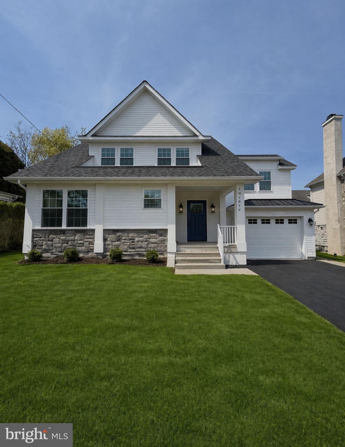 Welcome to 30 Buck Lane, a newly renovated & expanded residence completed in April 2026, set in the heart of Haverford along the prestigious Lower Merion School District of the Main Line.Designed with a modern, elevated aesthetic, the home blends clean lines with a refined mix of materials. Wide plank engineered hardwood floors, custom millwork and carefully selected stone surfaces create a look that feels both sophisticated and inviting, while oversized windows bring natural light throughout.The open concept main level is anchored by a sleek, thoughtfully designed kitchen with custom cabinetry, high end GE Cafe' appliances, and a striking quartz full height backsplash and counter tops, flowing seamlessly into the living and dining spaces for easy entertaining.  A bright first floor office adds flexibility, perfect for working from home.Upstairs, the primary suite offers a true retreat with soaring vaulted ceilings, and a spa inspired bath featuring an oversized rainfall shower and dual vanity.  Three additional bedrooms and a full hall bath with tub complete the second level.Thoughtful details continue with a second-floor laundry, a finished lower level, dedicated pantry, breakfast nook dining area and an attached one car garage.  A sizable rear yard invites future outdoor living. with ample space for a custom patio, landscaping or entertaining area.A rare opportunity on the Main Line, 30 Busk Lane delivers modern luxury with a clean, timeless edge.