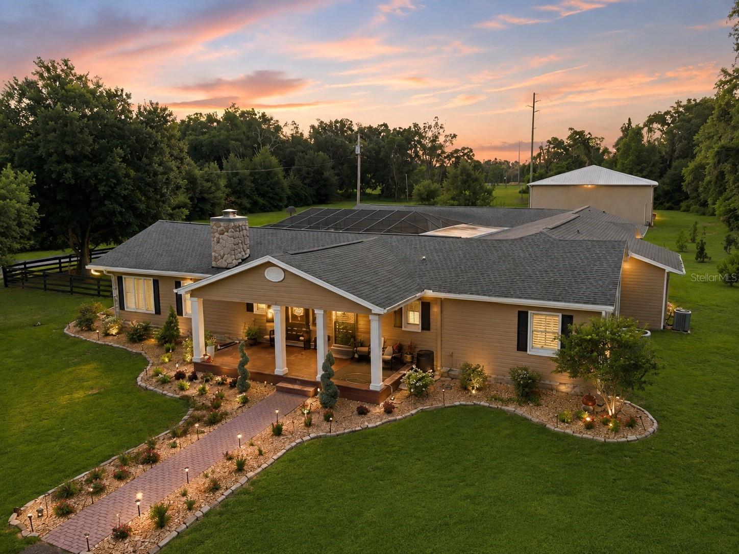 14.8 ACRES · GRANDFATHER OAK LINED DRIVEWAY · 4,088 SF · 3,000 SF DETACHED GARAGE · RESORT POOL AND SPA · AGRICULTURAL ZONING  -- THIS IS WHAT A TRUE SOUTHERN ESTATE LOOKS LIKE.Have you ever pulled down a driveway LINED WITH GRANDFATHER OAKS and felt like you arrived somewhere truly special? That is exactly what happens here -- every single time.This is 14.8 acres of agricultural land in Brooksville with a southern estate that has been thought through down to the last detail. One mile from the Brooksville Country Club. 40 minutes to Tampa. 15 minutes to the Brooksville Airport. And the kind of privacy that most people spend their whole lives searching for.Let's start outside because the infrastructure on this property is unlike anything you will find at any price point.A 5,000 GALLON PROPANE TANK AND WHOLE HOME GENERATOR. The entire property is CROSS FENCED giving you the flexibility to separate pastures, animals, or sections of land however you need. There is a FENCED GARDEN, a FENCED DOG RUN, and a FIRE PIT. HIGH SPEED INTERNET is available. And all of the furniture is available -- this one could be completely turnkey if that is what you are looking for.The RESORT STYLE SCREEN ENCLOSED SALTWATER POOL AND SPA were refinished in 2021 and include a salt chlorination system and in-floor cleaning system. Now the garages -- because this property has more covered storage than most commercial buildings. The ATTACHED GARAGE measures 32x22 with a 16x8 storage room. The DETACHED CONCRETE BLOCK GARAGE AND WORKSHOP measures a massive 50x60 feet with THREE 16-FOOT DOORS, a half bathroom, office space, a mini-split AC unit, a metal roof, and a 50 AMP RV HOOKUP outside. There is also a HALF COURT BASKETBALL COURT adjacent to the detached garage. Six car garage spaces total. Whatever you drive, tow, collect, or store -- this property handles it.Inside the home delivers the same level of detail. 4,088 SQUARE FEET. Five bedrooms and four full bathrooms. NEW ROOF 2022. NEW AC 2022 -- and all AC units include BLUE LIGHT SANITIZER for cleaner healthier air. The open concept formal living and dining areas feature a WOOD BURNING FIREPLACE and HAND SCRAPED ENGINEERED HARDWOOD FLOORS. PLANTATION SHUTTERS throughout the entire home.The CHEF'S KITCHEN is the heart of the home. GRANITE COUNTERTOPS. A DACOR DOUBLE ELECTRIC OVEN WITH 6 GAS BURNERS AND GRIDDLE. A POT FILLER above the stove. A MICROWAVE DRAWER. A BRAND NEW FISHER AND PAYKEL DOUBLE REFRIGERATOR AND FREEZER. A COPPER FARMHOUSE SINK. REVERSE OSMOSIS at the kitchen sink for pure clean drinking water. The 23x23 FAMILY ROOM is massive -- the kind of room that becomes the center of every gathering. The GAME ROOM features a READING LOFT above it and the MUDROOM includes a DOG SHOWER -- because someone here really thought of everything.The OWNER'S SUITE includes a SPACIOUS WALK-IN CLOSET and a RECENTLY REMODELED PRIVATE BATHROOM featuring a SOAKING TUB, WALK-IN SHOWER, and the kind of finishes that make getting ready feel less like a chore. There is also a READING NOOK with BUILT-IN BOOKSHELVES -- the kind of detail that makes you never want to leave this suite.Agricultural zoning. No flood zone. Cross fenced. Generator. 5,000 gallon propane tank. High speed internet. Furniture available. And a driveway lined with grandfather oaks that reminds you every single day why you chose this property.There is not another one like this. And there will not be!