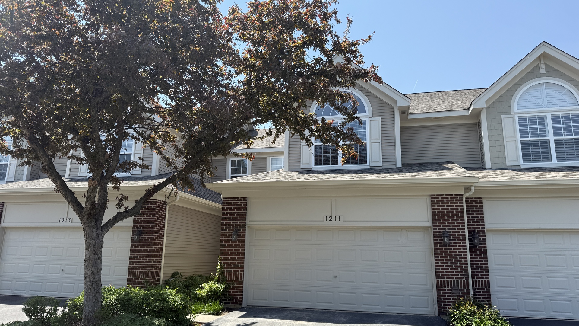 ** Showings will start on Sunday 3/1/26 ** Well-Appointed Townhome on a Premium Lot in Stonebridge backing to a beautiful open, green space!!! This stunning townhome in the desirable Stonebridge community offers the perfect blend of comfort, style, and location. It features 3 spacious bedrooms, 3.5 baths, and a full finished basement with a full bath! This home is move-in ready with neutral paint and newer carpet throughout.  The main door leads into a spacious foyer with coat closet. At the entrance there is a flex room which can be creatively used as a formal sitting room, library, first floor office or a formal dining room.  The inviting family room is filled with natural light and anchored by a beautiful fireplace. The updated kitchen shines with new flooring, newly refaced 42" cabinets, granite countertops, a deep double sink, and stainless steel appliances. The kitchen opens seamlessly to a generous dining area perfect for everyday living and entertaining. The adjacent patio door leads to the outdoor patio with gorgeous views of the huge open green area where you can enjoy morning coffee, or evening barbecue!  The stairs take you to the second floor loft which leads to three spacious bedrooms and two full baths. The large primary suite features a vaulted ceiling, tranquil views, a generous walk-in closet, and a luxurious ensuite bath with double vanities, soaking tub, and separate shower. The loft can be conveniently used as office area or a reading nook. The extra large third bedroom has vaulted ceilings and dramatic window filling the room with plenty of light.   The full finished basement expands your living space with a full bath ideal for recreation, entertainment, guests, or a home gym. There is abundant storage space in the basement. The laundry is conveniently located on the first floor near the kitchen. There is a finished 2 car garage.  This townhome is close to the expressway, train station, shopping, and restaurants!!! It is in the award winning district 204 with renowned schools and within walking distance to Metea Valley High School.   This home shows beautifully and offers exceptional value in a prime location. Don't miss this opportunity-schedule your showing today!