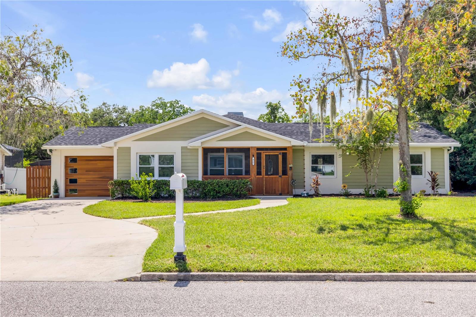 One or more photo(s) has been virtually staged. Welcome to your personal retreat in the heart of Winter Garden! Just a short distance from the charm of historic Plant Street. This meticulously maintained three-bedroom, three-bath pool home with a dedicated office blends relaxed luxury with everyday function in one of Central Florida's accessible, vibrant neighborhoods and with no HOA to limit your lifestyle. Go inside to find beautiful wood-look tile throughout, an open kitchen with stainless steel appliances, and an expansive 34-by-19-foot family room with vaulted ceilings centered around a stunning floor-to-ceiling stone fireplace. French doors open to your private backyard oasis, where a resort-style heated pool and spa (new pump 2024, new heater 2025) are surrounded by lush planting beds, a gas fire pit, and a covered dining area that's ideal for hosting year-round. The luxurious primary suite is a retreat, featuring a spa-like bath with a huge walk-in shower, double vanities, a soaking tub, and a custom walk-in closet. Practical updates include a new roof and air conditioner (2022), new windows (2017) and water heater (2018), giving you peace of mind and turnkey convenience. Privacy is guaranteed with a full vinyl fence, and the gated rear alley access makes room for your boat or RV, an exceptional find in this neighborhood. Enjoy golf cart rides to the West Orange Trail, weekly farmers markets, local restaurants and community events just minutes away.