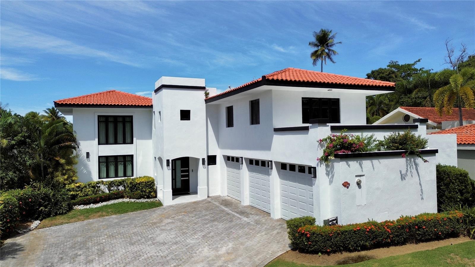 Located in Dorado Beach East, one of Puerto Rico’s most sought-after residential communities, this move-in ready residence offers approximately 5,000 square feet of living space on a 926.05 sq. m. lot. Set at the end of a quiet cul-de-sac, the home offers privacy with convenient access to both Dorado Beach East gates. The Hangar, Members’ Gym, tennis and pickleball facilities, dining, and other community amenities are just minutes away by golf cart. The residence features 4 bedrooms, 6.5 bathrooms, a private full-size saltwater pool, spacious terrace with BBQ area, wine cellar, smart home technology, and a new water cistern. Furnished and well-appointed, the home offers generous living spaces and effortless access to the Dorado Beach lifestyle, including beaches, golf, tennis, pickleball, fitness, dining, and resort amenities.