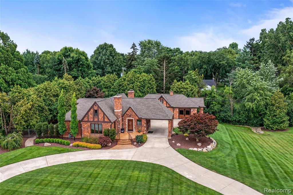 Here's the chance you've been waiting for:  The absolute most amazing home in Redford is now for sale.  Overlooking Western Golf & Country Club's 9th hole, wonderfully created and designed by the legendary Donald Ross.  Be the envy of every single golfer who passes by while playing.  Lovingly adorned with over $300k in recent updates, this 3 bedroom, 3.5 bath stunner has spared no expense.  Literally everything has been redone.  If you like to sit and watch golfers tee off on a par 3, you can on the newly stamped front porch.  Lavishly landscaped areas welcome you all around, with a private back area that embraces nature.  Weather bad and can't golf? Check out the 4 car garage that also has additional space for the golf simulator, which is heated and cooled with a new mini split - the entire setup (simulator negotiable) of an amazing private golf arena.  Enjoy a new roof with copper gables and lifetime warranty.  Inside, prepare to be stunned - all new LED lighting, baths, painting, carpeting and flooring, finished basement, multiple fireplaces.  New HVAC, Water heater, mini split, and more.  Finished basement with bath, steam shower, tons of storage to give a few ideas.  Custom blinds and window tint, custom closet organizers, new security system, heated driveway, all new fixtures, handles, generator hookup and electrical panel with transfer switch, and so much more.  All new appliances, new 2 zone irrigation, etc.  Come be the envy of the town and call this home!