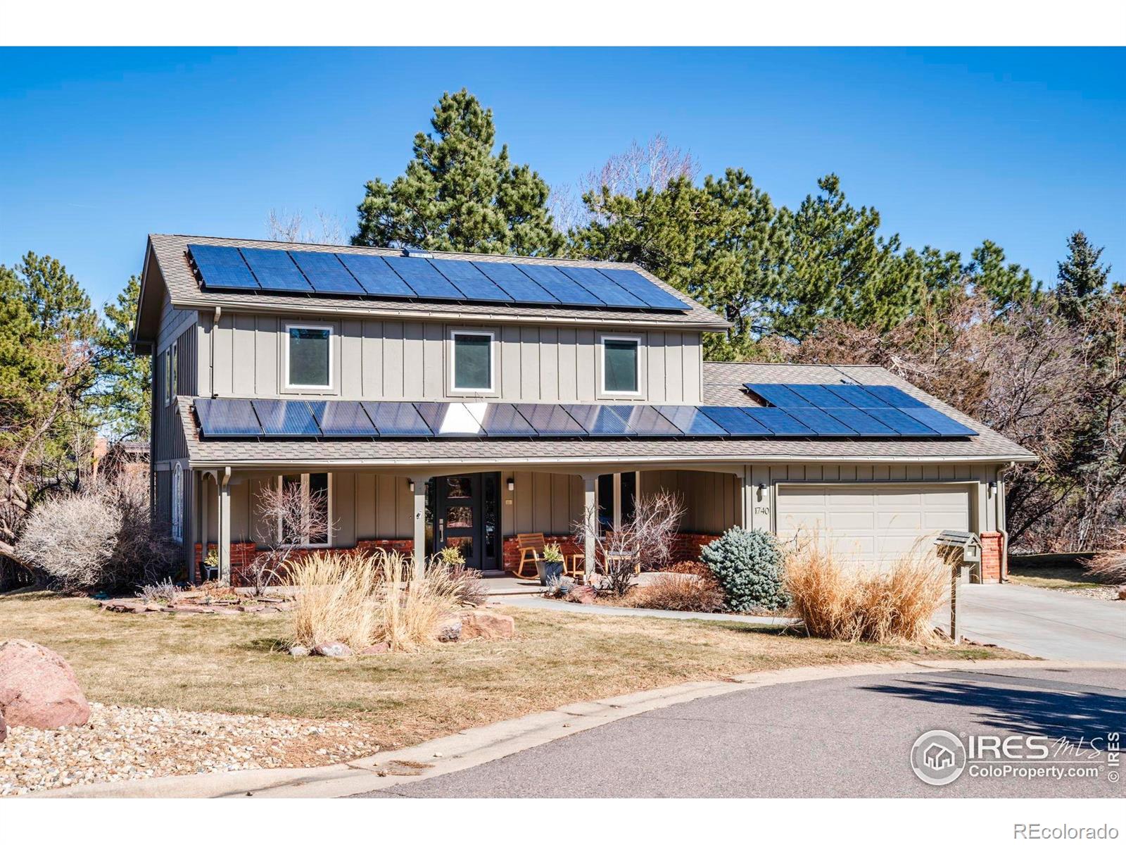 Amazing location in Devil's Thumb. This thoughtfully updated 5 bed/4 bath home is nestled in one of Boulder's most sought-after neighborhoods. Refinished hardwood floors, vaulted ceilings, and an updated kitchen with quality finishes set the stage for inviting living spaces. The main level features a formal living room, eat-in dining area, and cozy family room with two newly added skylights that fill the space with natural light. Fresh interior and exterior paint, custom built-ins, and stylish lighting add warmth and character. There are four bedrooms on the upper level and it features a remodeled primary bathroom offering a spa-like retreat. The finished basement has a bedroom, a bathroom, and rec room - which makes the flexible floor plan perfect for hosting guests, working from home, or creating a space to play. The secluded backyard oasis has a flagstone patio and spacious deck, all surrounded by lush landscaping and stunning mountain views. Located just steps from miles of scenic trails, top-rated schools, and an exclusive HOA with a private pool and tennis courts, this exceptional home offers the perfect blend of nature, comfort, and community. All measurements to be verified by buyer.