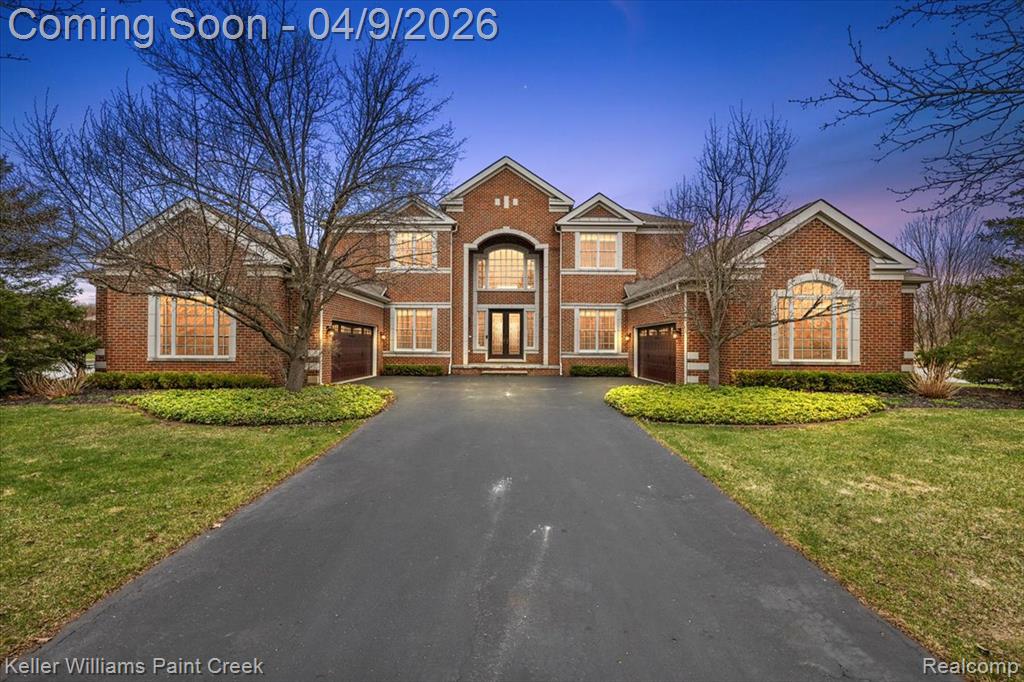 Welcome to one of the most distinguished waterfront estates in Milford’s Preserve at Maple Lake, where privacy, scale and connection to nature converge. Positioned at the end of a quiet cul-de-sac and spanning over an acre, this property features 366 feet of frontage on spring fed Maple Lake, offering expansive panoramic views and a shoreline presence nearly impossible to duplicate. Beyond the water, enjoy direct neighborhood access to Kensington Metropark for miles of paved trails in one of Southeast Michigan’s premier outdoor destinations. Inside, over 7,700 sq ft of finished living space unfolds w/intention. Originally one of the community’s model homes, it was designed for both scale and livability. A dramatic two story foyer w/dual sweeping staircases sets the tone, leading into light filled living areas framing the lake from multiple vantage points. A sun filled conservatory & remodeled kitchen anchor the main level, blending elegance w/everyday function. A private main floor bedroom w/full bath offers ideal guest or multi generational living. Upstairs, the primary suite opens to a private balcony overlooking the lake, perfect for sunrise coffee or quiet evenings. The walkout lower level is designed for elevated entertaining w/a bar, wine cellar and expansive recreation space flowing outdoors. Outdoor living is equally impressive w/an expansive Trex deck, paver patio, gazebo and gas line. A sweeping lawn leads to the water’s edge, where a private dock invites paddleboarding, kayaking, fishing and sunset cruising. Maple Lake offers exceptional fishing and abundant wildlife, with frequent sightings of swans, ducks, eagles and ospreys, all within a rare “silent zone” lake setting. A whole house generator ensures uninterrupted comfort. Located just minutes from downtown Milford, this is a rare opportunity to own a property delivering true waterfront scale with unmatched access to both lake and land recreation. Homes here move quickly, schedule your showing today!