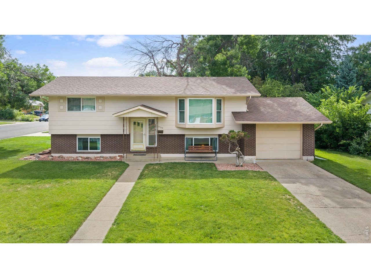 Homes like this rarely hit the market. For the first time since it was built, this cherished original owner home is ready for its next chapter. Lovingly maintained and move-in ready, it reflects years of pride in ownership. Natural light fills the inviting living spaces, while the thoughtful layout offers comfort, flexibility, and room to grow. Outside, you'll discover one of the property's most impressive features: a beautifully maintained backyard with lush, pristine grass and an incredible 712-square-foot detached garage. Whether you need extra room for vehicles, recreational toys, or storage, this is the kind of space buyers are always searching for. The garden level adds even more flexibility with two additional bedrooms, a full bath, and a small unfinished shop area that's perfect for projects or additional storage. Located in an established neighborhood with no HOA and just minutes from Downtown Fort Collins, this home combines charm, functionality, and exceptional space in a way that's becoming increasingly difficult to find.