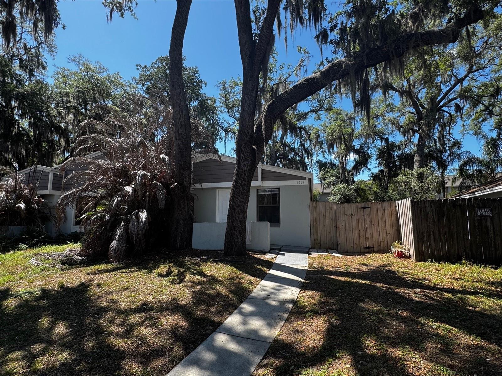Fully updated duplex just minutes from UCF! Conveniently located just off N Alafaya Trail, this home is just minutes from everything Alafaya, Waterford, and Oviedo have to offer. Less than 3 miles from Publix, Walmart, UCF, Lowes, Home Depot, and so much more! Approaching the home you’ll find beautiful Oak canopies for shade and a driveway for off-street parking. Enter the home to a beautifully updated kitchen with new cabinetry, countertops, and more. The Home has been updated with fresh paint and newly textured ceilings throughout. The large living room has an opening to the kitchen, great for entertaining or staying connected to family while cooking. The bathrooms are also newly updated with brand new cabinetry and shower stalls! New HVAC 2025! Tons of brand-new updates throughout! The home was even re-plumbed in 2025! NEW ROOF 2022! This one won’t last, schedule your private showing today!