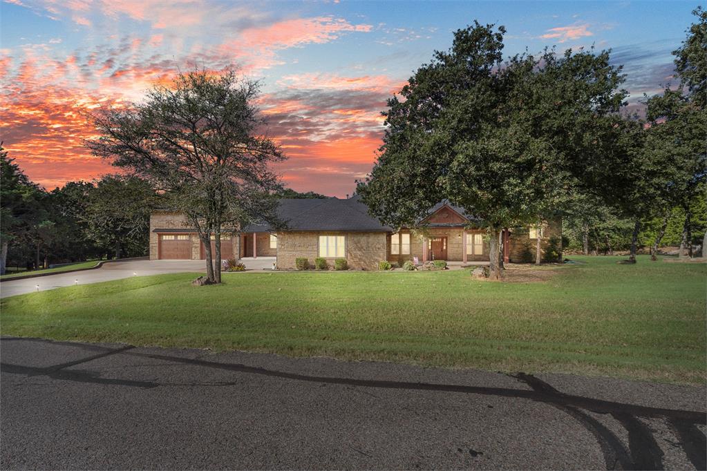 Nestled in a private, gated enclave near Lake Arcadia and Historic Route 66, this one of a kind Brent Gibson designed estate blends timeless design, thoughtful functionality, and serene natural beauty. All just 15 minutes from downtown OKC.
Built in 2011 and set on a peaceful, wooded lot, this single level luxury estate offers 3 spacious bedrooms plus a private office with full en suite bath, perfect as a 4th bedroom or nursery. Expansive picture windows line the back of the home, offering breathtaking views of Oklahoma sunsets, wildlife, and the tranquil koi pond complete with waterfall and fountain. This tranquil water feature makes the backyard feel like a private retreat.
The open layout is anchored by a chef’s kitchen, flowing seamlessly into two spacious living areas. One is purposefully designed for entertaining, complete with a wet bar, built-in pub-height bar, and cue cabinet. A true game day retreat!
The primary suite is a private sanctuary, featuring vaulted ceilings, a luxurious ensuite bath with soaking tub, dual head walk-in shower, and coffee bar, plus an expansive walk-in closet with custom built-ins and center island.
Additional highlights include the oversized laundry room with built-in mail station, mudbench & storage closet. The impressive 4-car garage with dedicated half bath AND 1,000+ sq ft unfinished bonus room above garage, pre-wired for electric and plumbing. This space ideal for guest suite, studio, or theater. Plus the extensive storage throughout the entire home!
This home blends privacy, elegance, and function in a way few others can. With timeless architecture and incredible attention to detail, it's truly one of Edmonds hidden gems.
Located in one of East Edmond’s most coveted areas, this home offers both unmatched privacy and easy access to Edmond schools, shops, and dining. All minutes from nature, trails, and the heart of the city.