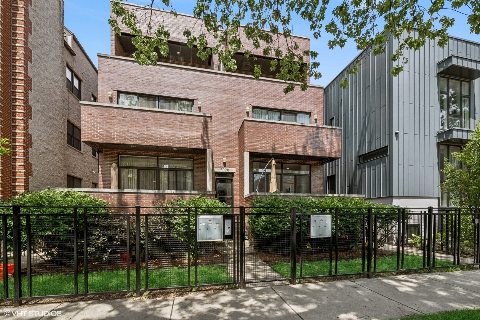 Preferred Lender offering 1 year temporary buydown. Get a rate in the 5's! Gorgeous 3 bedroom 2.5 bathroom duplex down in a full brick building in Ukrainian Village with two large private outdoor spaces including a front balcony and a massive private rooftop deck. This huge condo is located on a quiet one way tree lined street just steps from all of the shops and restaurants on Division Street. This unique floor plan has a large front porch perfect for indoor/outdoor entertaining which is located off a spacious living room with dry bar with wine/beverage fridge and a gas burning fireplace. The dining area easily fits a table for 8 and the kitchen has soft close cabinets/drawers, an island with seating for 3, Viking appliances and a new dishwasher. Completing this level is a powder room half bath, 8 foot doors, a large walk in pantry and 11 ft ceilings w/ massive south facing windows. Downstairs this lower level is everything you thought you couldn't find with a unique floor plan that has a second huge family room PLUS three large bedrooms and two full bathrooms. The amazing primary suite easily fits a king sized bed and has large closets and an ensuite spa bathroom with a separate jetted tub and steam shower with body sprays. The lower level is finished off with radiant heated floors throughout, professionally organized closets, in unit laundry, and tons of storage.  On top of all this you get the private garage roof top deck to entertain and have that 'back yard' space + 1 garage space.  Well maintained building: Building was tuckpointed 2020, iron on building was painted 2019, and rentals are allowed (although currently none are rented). No upcoming specials.  This home does not currently have a homeowner's exemption, but the sellers are in the process of applying for a Certificate of Error to have one added which will lower the property taxes.  Amazing walk to it all location near Pritzker Elementary.