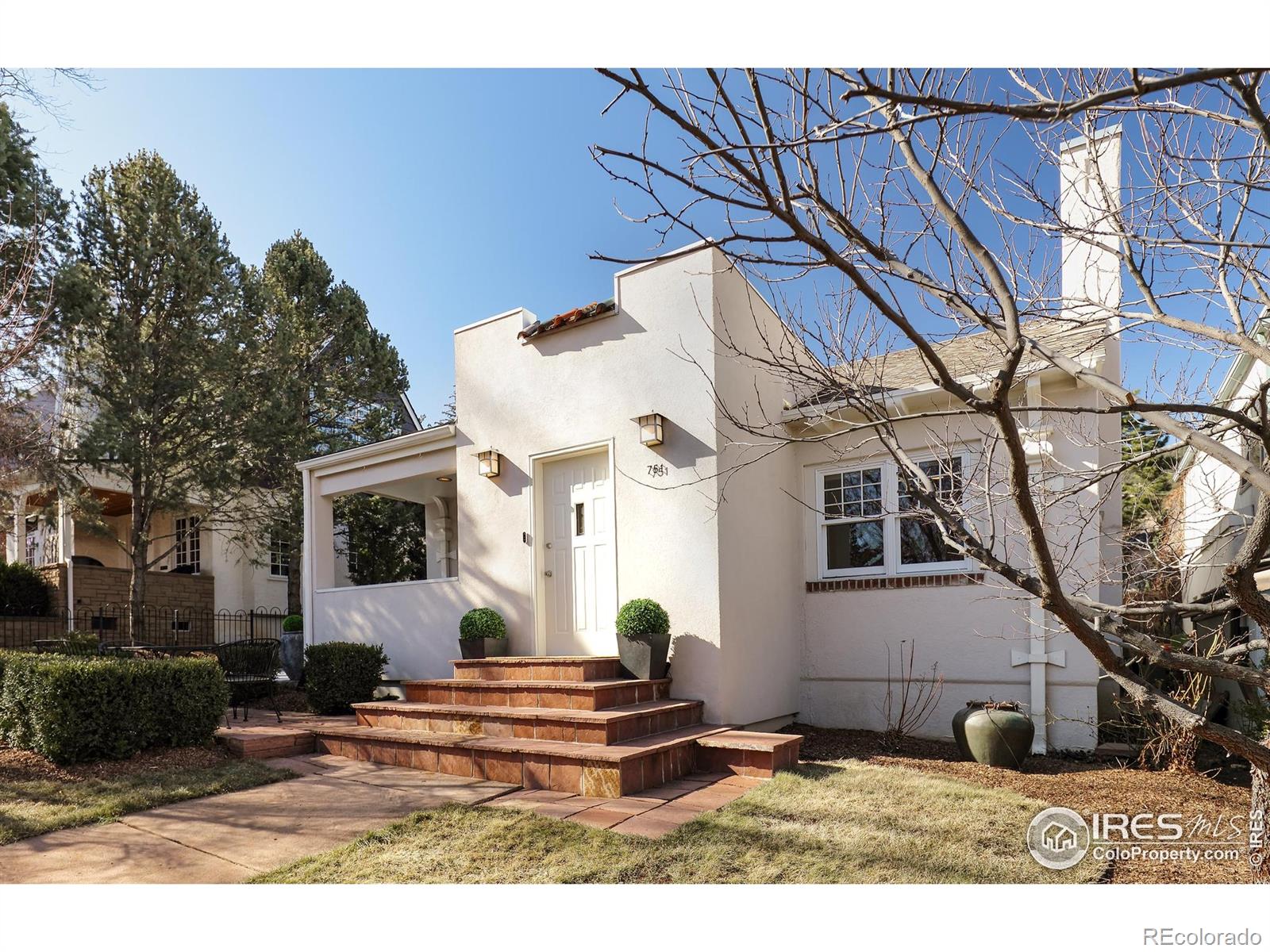 This thoughtfully updated Chautauqua 3BD/2.5BA home shines with pristine sun-kissed interiors, beautifully landscaped outdoor space and an unbeatable location just steps from Chautauqua Park and Trails and 2027 Sundance Film Festival events. A tiled foyer welcomes you inside this 2,490SF charmer filled with amazing natural light, refinished hardwood floors, fresh paint and new ceiling fans. Relax alongside a fireplace and oversized windows in the open floor plan living room, or plan your next dinner party in the spacious dining room. Chefs will love the open kitchen, where custom cabinetry, a pantry, breakfast bar, new pendants and granite counters surround stainless steel Bosch and Electrolux appliances. Ahead, the indoor-outdoor family room flows seamlessly to a large patio, perfect for al fresco dining and lounging. Throughout the special property, the lovingly maintained landscaping includes fully irrigated lawns, mature trees and plantings surrounded by handsome stonework and redwood fencing. Back inside, two large bedrooms share a recently remodeled bathroom. A convenient powder room and a large laundry room with a newer LG washer-dryer complete the main level. Upstairs, the expansive owner's suite includes a large balcony, an oversized walk-in closet and a freshly updated, windowed en suite bathroom. The home's extensive upgrades include newer Marvin and Andersen windows, a new roof and insulation, solar panels, Tesla Powerwall, upgraded electrical panel, EV charger, a new radon system, an energy-efficient boiler for five-zone hydronic heat and hot water, and a four-zone Mitsubishi AC system. A long two-car driveway with a 30-amp RV electrical outlet, manicured landscaping and a charming patio add wonderful curb appeal to this turnkey sanctuary. This sought-after neighborhood is surrounded by thousands of acres of open space, Chautauqua's newly updated auditorium, world-class trails, Basemar Shopping Center, the CU campus and Downtown/Pearl Street amenities.