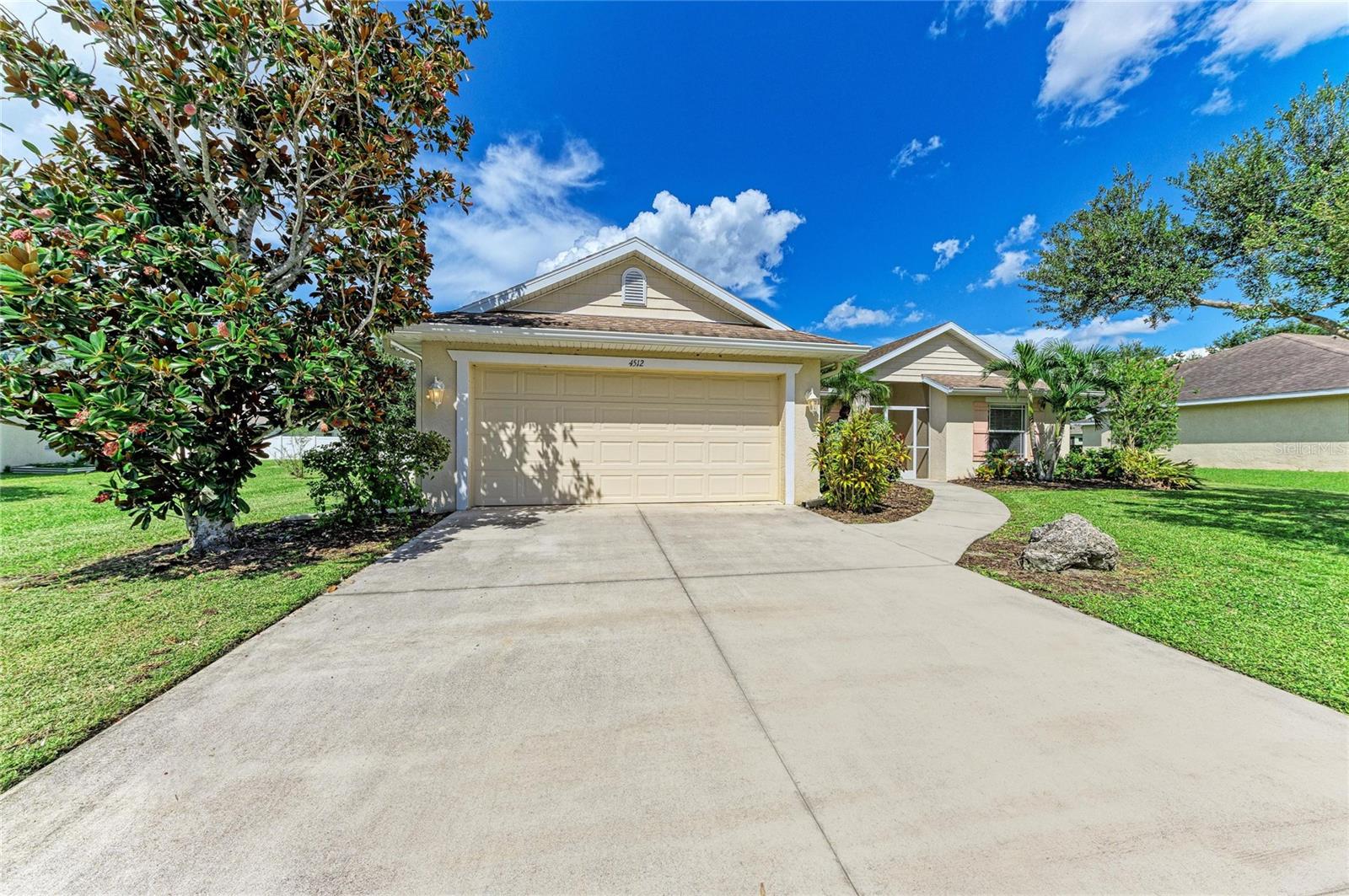 Virtually Staged. Welcome home to this naturally bright and airy 3-bedroom, 2-bath single-family pool home in the desirable Sugar Mill Lakes community. Situated on a spacious lot with excellent curb appeal and a vinyl privacy fence, this home is designed for comfortable Florida living inside and out.Step inside to an inviting great-room floor plan custom built by Geartz construction, featuring soaring ceilings that create a bright, open feel. The spacious kitchen offers a tubular solar skylight on your vaulted ceiling, allowing the natural light to pour in. The large island with high-top bar seating provides the perfect gathering spot for casual meals and entertaining. The generous dining area offers plenty of room for family dinners and special occasions.The primary suite is a relaxing retreat with a tray ceiling, a large walk-in closet, and a spacious en-suite bathroom featuring a walk-in shower. Two additional bedrooms and a full guest bathroom provide flexibility for family, guests, a home office, or hobby space. All 3 bedrooms and both bathrooms have just been freshly painted (September 2026).Outside, enjoy your own private backyard oasis with a newer heated saltwater pool and spa, all surrounded by a vinyl privacy fence and huge grassy area—perfect for relaxing, entertaining, and enjoying Florida’s year-round sunshine.Sugar Mill Lakes offers a neighborhood playground, tennis and basketball courts, low HOA fees, and no CDD fee. The community is centrally located with convenient access to Manatee Memorial Hospital, boating and waterfront activities along the Manatee River with access toward Tampa Bay, as well as downtown Bradenton’s Riverwalk area with restaurants, entertainment, and nightlife.Ready for immediate occupancy, this home offers the space, location, amenities, and Florida lifestyle you’ve been looking for.