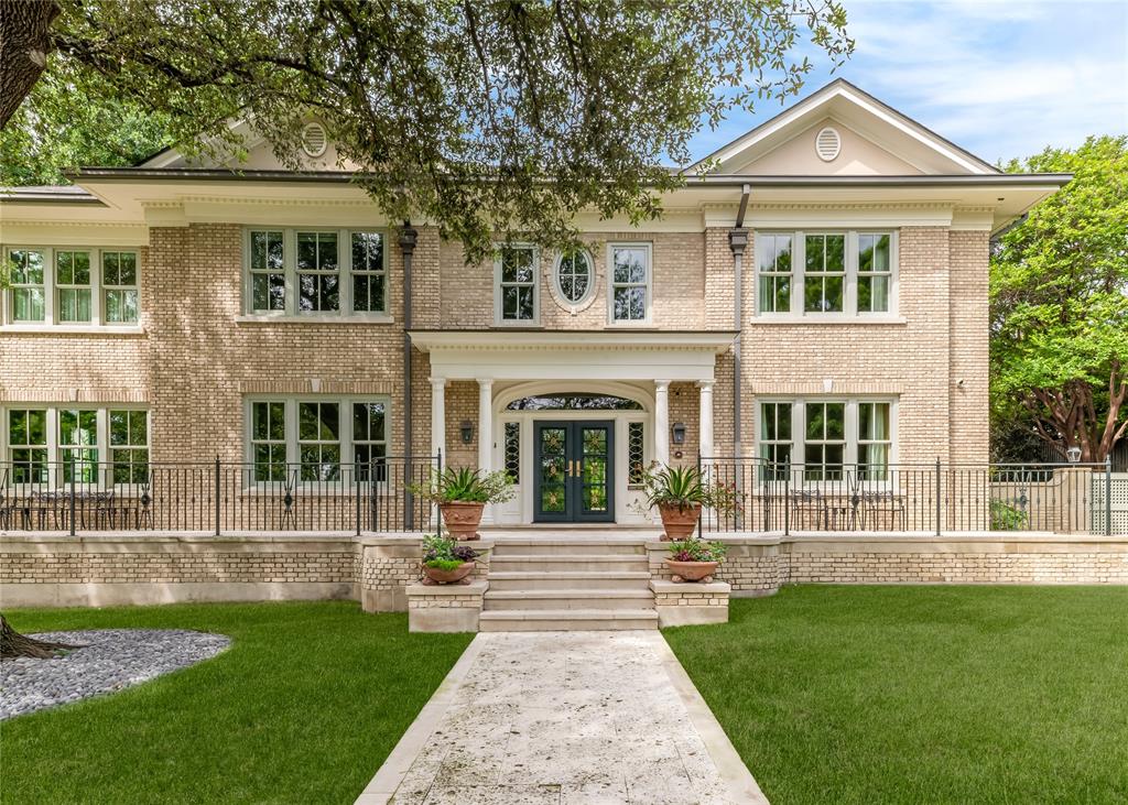 Poised on Lakeside Drive overlooking Turtle Creek, this urban sanctuary is zoned to the coveted Highland Park Independent School District.  This distinguished residence stands as one of the neighborhood's most enduring architectural treasures - a century-old estate masterfully reimagined for contemporary life.  An exhaustive restoration, completed from 2020–2022, preserved the home's storied character while infusing every inch of the property for today’s modern lifestyle.  A gracious entrance foyer sets an immediate tone of elegance, flowing effortlessly into formal living and dining rooms appointed with wide-plank white oak floors and exquisite plaster millwork. A handsome private study overlooks the lush, private backyard.  Five generously proportioned en suite bedrooms offer serene retreats for family and guests, while a versatile third-floor flex room provides space for a studio, media room, or additional lounge. A beautifully appointed guest suite with full bath above the three-car garage offers privacy for guests or an additional living space. The enchanting grounds include a side courtyard centered on a classic fountain, while the secluded rear grounds reveal a koi pond, mature landscaping, and a dedicated greenhouse.  All three floors of the home are accessible by elevator.  4211 Lakeside was originally designed by renowned French architect Harre M. Bernet and built by S.J. Churchill in 1922.The renovation included new electrical, plumbing, roof, HVAC, doors, and windows.