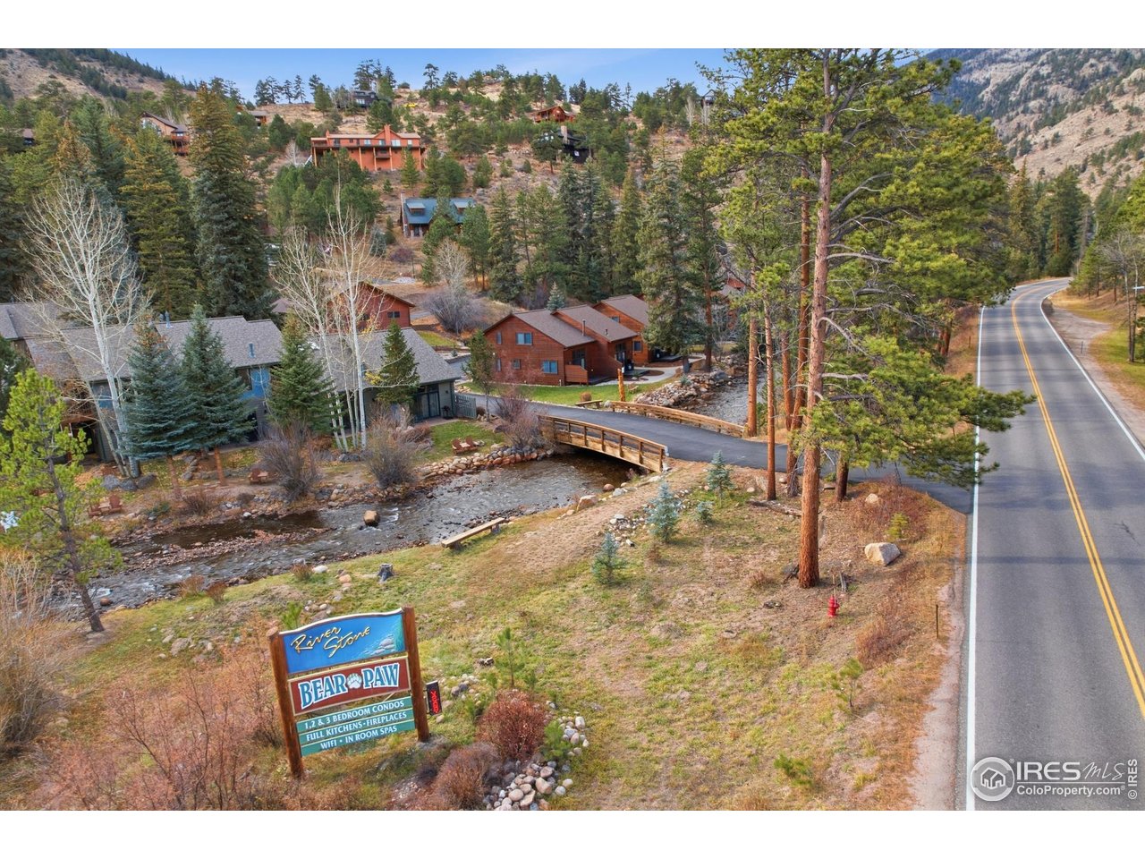Wake up to the sound of Fall River just outside your door at this fully furnished riverfront condo in Estes Park. Located minutes from the Fall River entrance to Rocky Mountain National Park, this turn-key vacation property offers both personal escape and strong income potential. Vaulted ceilings and a wall of windows flood the space with light and mountain views, while the lock-off upper bedroom adds rental flexibility. On-site management handles marketing, bookings, cleaning, and maintenance-making ownership effortless. Excellent rental history with future reservations already on the books. HOA dues cover all utilities. Near trails, dining, and adventure, this is your chance to own a riverfront retreat that pays for itself and builds long-term value.