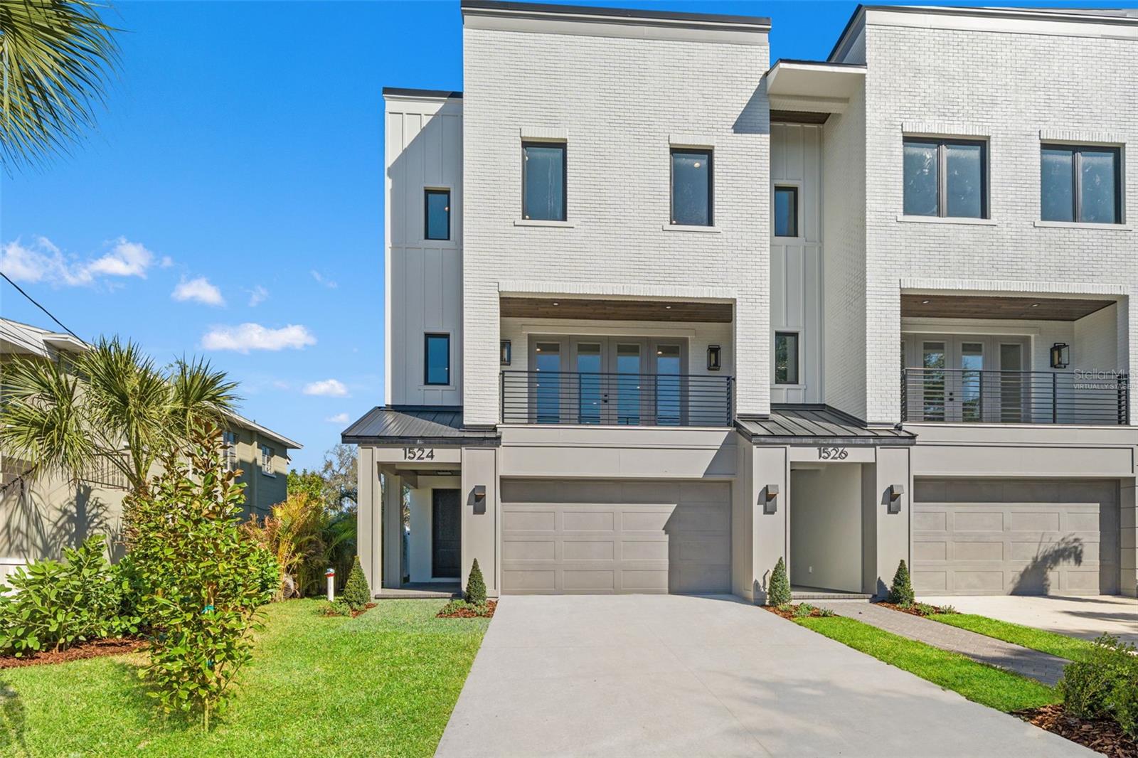 One or more photo(s) has been virtually staged. Introducing an exclusive collection of just four beautifully curated townhomes, by a local renowned Southern Living Custom Builder known for exceptional craftsmanship and timeless design. Every detail has been thoughtfully considered, delivering the high-end finishes and quality construction you’ve come to expect from the Devonshire name.Each residence offers 4 bedrooms and 3.5 baths, private elevator access, and inviting private balconies and backyard spaces—perfect for both everyday living and entertaining. The first floor features a bedroom with a full bath, ideal for a guest suite, home office, or flexible living space.The second floor is the heart of the home, designed with an open, light-filled layout that’s perfect for gathering. A designer chef’s kitchen anchors the space, complete with GE Café appliances, including a 36" Smart All-Gas Commercial-Style Range with six burners, a huge walk-in pantry, and generous storage throughout. The living and dining areas flow seamlessly and open to a front-facing balcony, creating an effortless indoor-outdoor feel.The third floor is a true retreat, featuring an expansive primary suite with a spa-like en-suite bath and a large walk-in closet. Two additional bedrooms share a well-appointed hallway bath, while a conveniently located laundry room completes the level.Perfectly situated in Palma Ceia, just half a mile from iconic Bayshore Boulevard, within a few blocks of Palma Ceia Golf & Country Club and the Howard Avenue dining scene, and just over a mile to Hyde Park Village, this rare offering blends luxury, thoughtful design, and an unbeatable location—where elevated living meets everyday comfort.