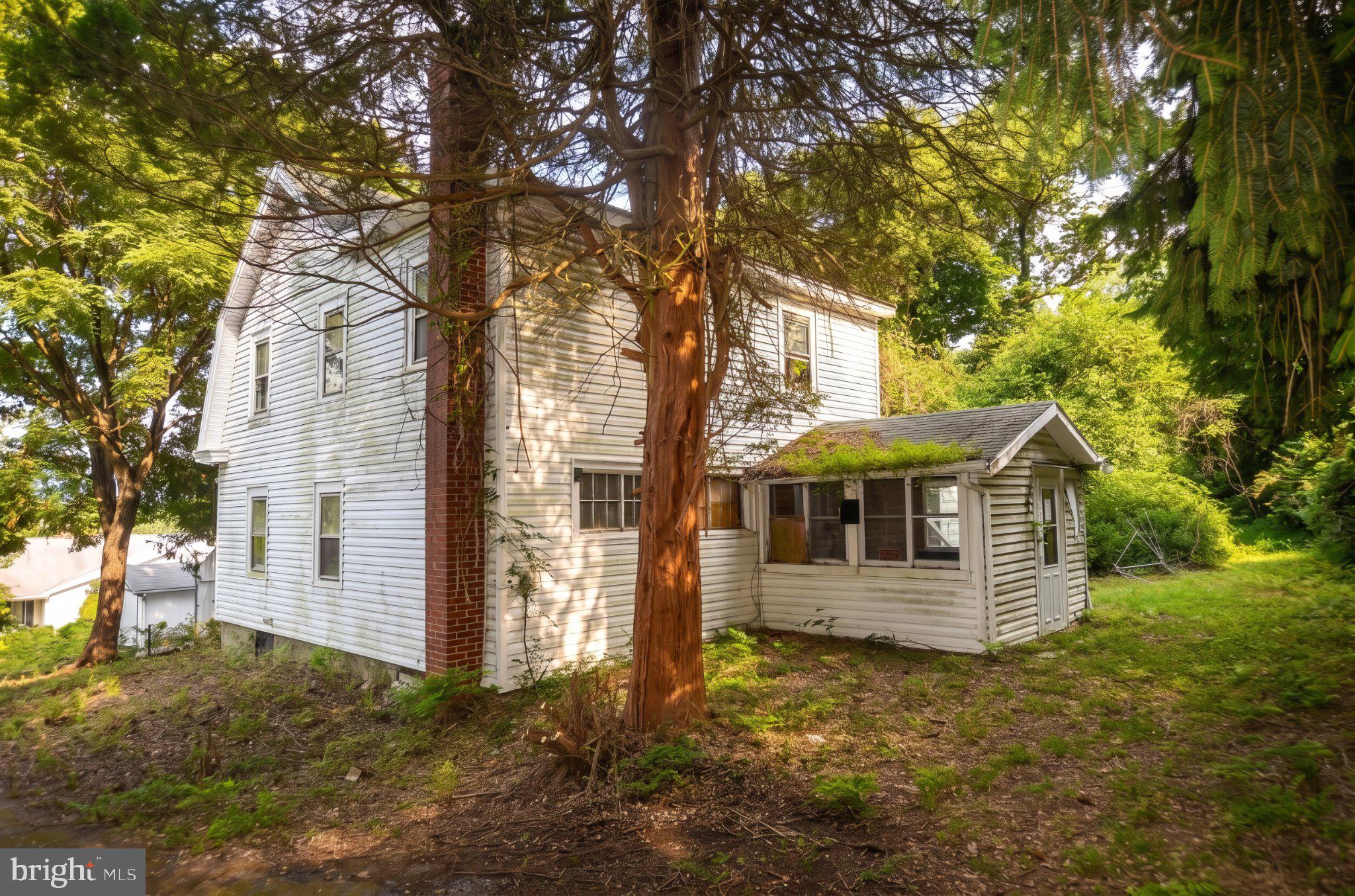 Fantastic private location between Blue Ridge Summit and Waynesboro PA. 2 story home on over half acre lot with public utilities including water and sewer. Ideal for renovation or excellent level building lot. Mature trees and off the main road for added seclusion. Plenty of options!