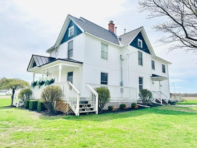 Welcome to this Sprawling Farmhouse Abode that is Situated Perfectly on a Peaceful, 2.96 Acre Parcel. Upon Entering, You Just Might Believe that You Have Jumped into a Magazine. Everything about this Four Bedroom, Four Bathroom Home is Astounding. The Bright and Fully Renovated Kitchen Expresses a Modern Style and is Complete with all Newer Appliances. The Wood-Burning Stove Anchors the Kitchen to the Dining Room and Living Room, Enhancing the Convenient Open Floor Plan with Warmth, and Coziness. Meandering into the South Addition (2007), You are Greeted with the Substantial Primary Suite which Features a Convenient Walk-in Closet, along with a Spacious Full Bathroom that is Completed with Heated Tile Flooring. The Second Bedroom Neighbors the Primary Suite and is Finished with a Large Closet. There is an Additional Full Bathroom with Heated Tile Conveniently Located Just Outside of Both Bedrooms.The Main Level is also Home to a Spacious Sitting Room, another Full Bathroom, and the Huge Mudroom/Laundry Room, Completed with Ample Storage Space. Meandering Upstairs, You will Find an Additional Full Bathroom, Along with Two More Ample Sized Bedrooms. The Upstairs is also Exclusive to the HUGE Family Room, Showcasing Heightened Ceilings, and So Much Room for Multiple Different Activities! Winding Back Down and to the Basement, You are Greeted with yet Another Commodious Space~ Perfect for Get-togethers, a Private Work-out Area, or to just Relax. Back to the Main Level and Flowing to the Outside, You will Find the Spectacular, Brand-new 32x60 Fully Insulated Pole barn with a 12 Foot Ceiling~ Equipped with Water, Floor Drains, Heat, 220 Hook-up, and All LED Lighting (outdoor lights are on a timer). There are Three Electric Garage Door Openers. Door Measurements~ One is 12x11 & Two are 10x10. There is a New Roof on the House~ Storm Master Shingles (2024). There are Three Central Heat/Central Air Units. Propane or Wood can be used for Heating. There are Two On-demand Water Heaters. The Yard and Landscaping is Fully Irrig
