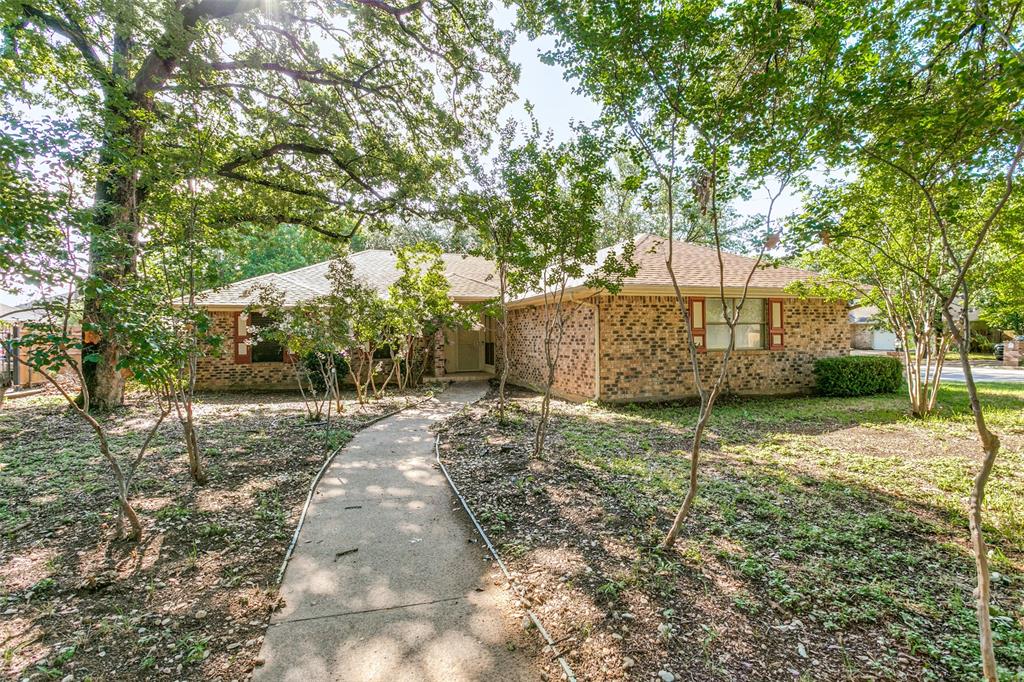 Take advantage of this incredible opportunity! Situated on a desirable corner lot with mature landscaping, this home is tucked away in one of North Bedford’s most sought-after neighborhoods. Its prime location offers convenient access to local restaurants, retail, and just minutes from DFW Airport.
Inside, you’ll find a well-designed layout with separated bedrooms for added privacy, two generous living spaces, and two dining areas, making it ideal for both everyday living and entertaining. The wood-burning fireplace adds warmth and character, while the spacious covered patio facing east is perfect for relaxing outdoors.
Recent upgrades include a beautifully updated primary bathroom and fresh paint throughout the interior, giving the home a clean, modern feel. There’s so much room to personalize and make it truly yours!