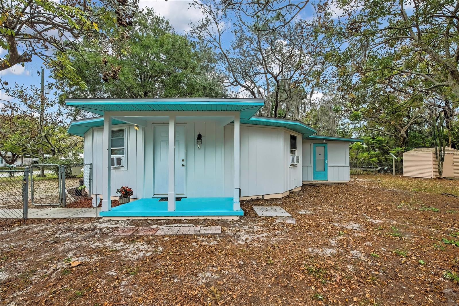 One or more photo(s) has been virtually staged. One or more photos have been virtually staged.**MOVE-IN READY **  **MOTIVATED SELLER**Step into something truly unique with this charming round home located in the heart of Hudson! Once inside you immediately feel the charm.  Make this home your own. This well-maintained two-bedroom, one-bath residence sits on an oversized lot with plenty of space to store your boat, RV, recreational toys, or create the outdoor oasis you've always wanted.  Designed for comfortable living and entertaining, the fully fenced yard offers privacy, functionality, and plenty of room for family gatherings, pets, and outdoor enjoyment. Inside, you'll find tile flooring, fresh interior and exterior paint, including a brand-new roof installed in 2025 and a water purification system less than two years old.  The inviting lanai provides versatile flex space perfect for a home office, fitness area, hobby room, or relaxing retreat. A convenient storage shed adds additional room for lawn equipment, tools, and extra storage needs. Adding even more value, the septic system replaced in January 2026. With its distinctive character, oversized property, and endless possibilities to personalize.  Located approximately 3 miles from Bayonet Hospital, also, nearby are resturants, and shopping. Weeki Wachee Springs less than an hour away. This one-of-a-kind home is an incredible opportunity at under $175K.  Schedule your private showing today and experience the charm of round-home living for yourself!  Best Deal In Town!!!!