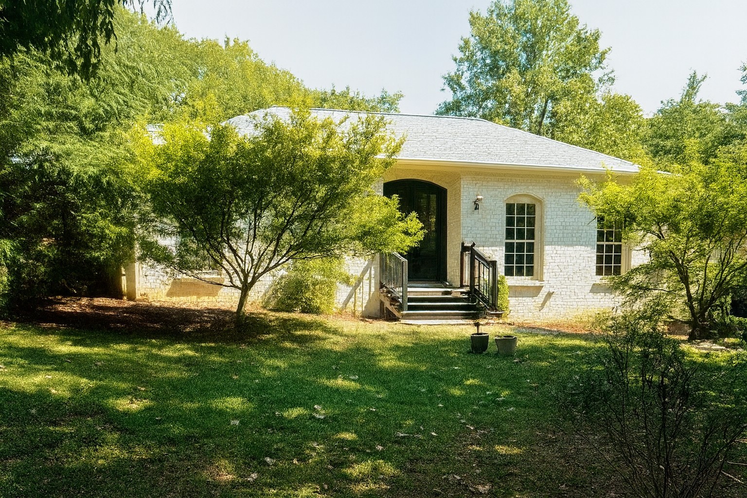One level Brentwood ranch with rear entrance apartment.  Open floor plan and beautiful wooded lot.  Zoned Scales/Brentwood/Brentwood Schools.  Home has some deferred maintenance and selling in as-is condition.