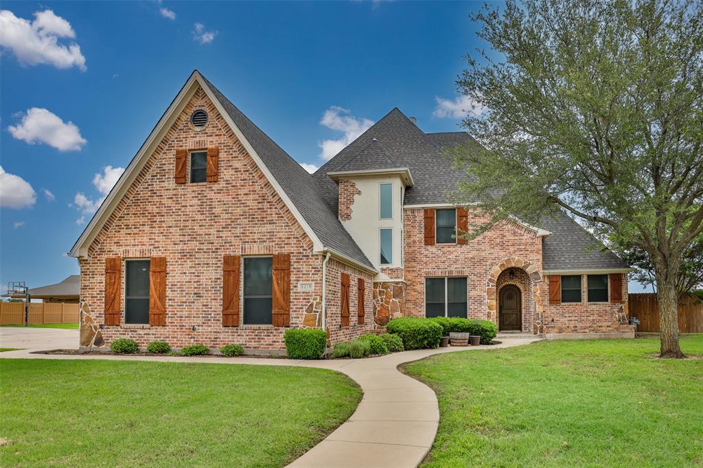 A GIANT OPPORTUNITY TO GRAB A BIG PROPERTY IN LINDSAY, TX!  Here's your chance to live in Nortman Estates and secure a 3491sf, 3-story home featuring 6 bedrooms, 4 bathrooms and a 720sf pool house.  This house features a primary suite on both the first and second floor, a beautiful kitchen complete with granite counters, stainless appliances and a built in refrigerator.  Loads of built-ins throughout the home, trayed ceilings, crown molding, a 250sf screened in porch, and an unfinished third floor ready for your imagination, are just a few of the highlights.  Outside, you will find an outdoor entertaining oasis featuring a swimming pool with a built in hot tub and rock waterfall, a pool house that includes a bathroom and a kitchenette, an outdoor shower, lots of patio space and a 238sf covered porch area to relax under cover.  Large corner lot without a backyard neighbor, a 3 bay garage with two parking spots and a workbench area, a sturdy backyard privacy fence and plenty of room for extra parking.  Seller just finished repainting the entire interior of the house, exterior touch ups, and replacing all the carpet.  Pentex Electric, Atmos Natural Gas, and City of Lindsay serve as the utility providers. Lindsay ISD!!