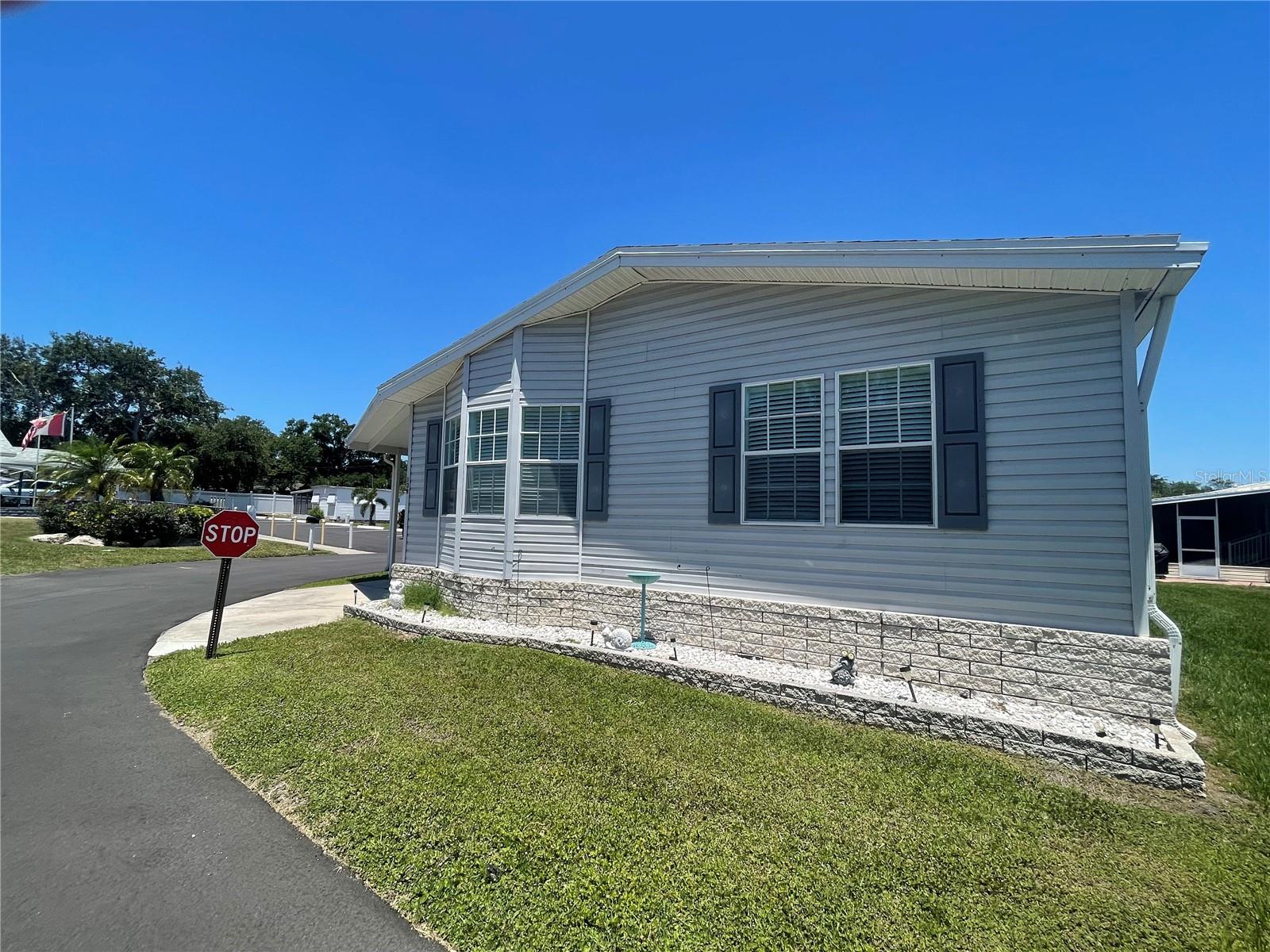 Under contract-accepting backup offers. Located in the highly desirable Boca Ciega Mobile Home Park community in Largo, this spacious 2-bedroom + flex room, 2-bath manufactured home offers 1,475 square feet of comfortable Florida living. The versatile flex room is perfect for a home office, hobby space, guest room, or den to fit your lifestyle needs.Step inside to find an open and inviting floor plan filled with natural light, generous living and dining areas, and plenty of storage throughout. The well-appointed kitchen offers ample cabinetry and workspace, making entertaining easy and enjoyable. The primary suite features a private bath and spacious closet, while the second bedroom provides comfort and privacy for guests or family.Enjoy relaxing mornings and peaceful evenings in this friendly co-op community known for its convenient location near Gulf beaches, shopping, dining, golf, and entertainment. Boca Ciega offers an active lifestyle with community amenities and a welcoming neighborhood atmosphere.Whether you’re searching for a year-round residence or a seasonal retreat, this well-maintained home combines space, flexibility, and location in one exceptional opportunity.