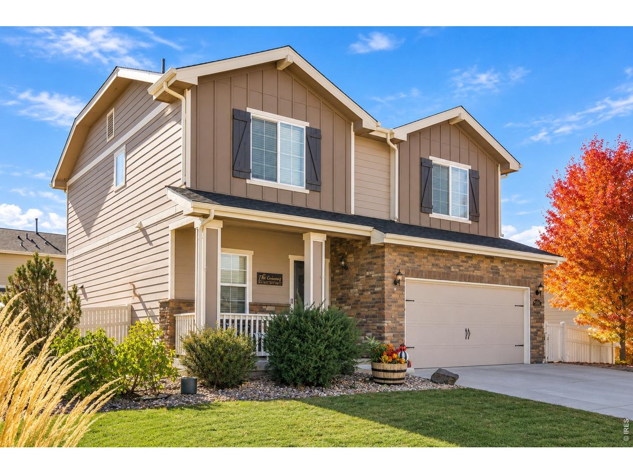 Imagine having the neighborhood park and Firestone Charter Academy just a short walk down the street! Welcome to 5592 Tumbleweed Avenue, located in the desirable Shores neighborhood of Firestone, where convenience, community, and comfortable living come together. This 4-bedroom, 4-bathroom home offers the space and flexibility to fit the way you live. The inviting main level provides a welcoming place to gather, while the upstairs loft creates the perfect opportunity for a home office, study area, or additional retreat. Upstairs, you'll find three bedrooms, including a primary suite with a private bathroom and upgraded closet organization. The finished basement offers even more possibilities, featuring a spacious second living area, fourth bedroom, full bathroom, and generous storage. Whether you're hosting overnight guests, enjoying movie nights, or creating a dedicated hobby space, there's room for it all! Step outside to a backyard designed for enjoyment without the endless upkeep. Pet-friendly artificial turf, a greenhouse, and a storage shed provide a wonderful combination of practicality and outdoor living. Recent improvements include a new roof in 2024, water heater in 2025, updated flooring in 2026, and newer kitchen appliances. An expanded driveway provides additional parking beyond the two-car garage. Living in The Shores means having neighborhood parks, walking trails, and recreational opportunities close to home, along with convenient access to Firestone's shopping, restaurants, and everyday amenities. With room to spread out, meaningful updates, and a location that puts so much within reach, this home offers more than just a place to live. It offers a lifestyle you'll love coming home to!