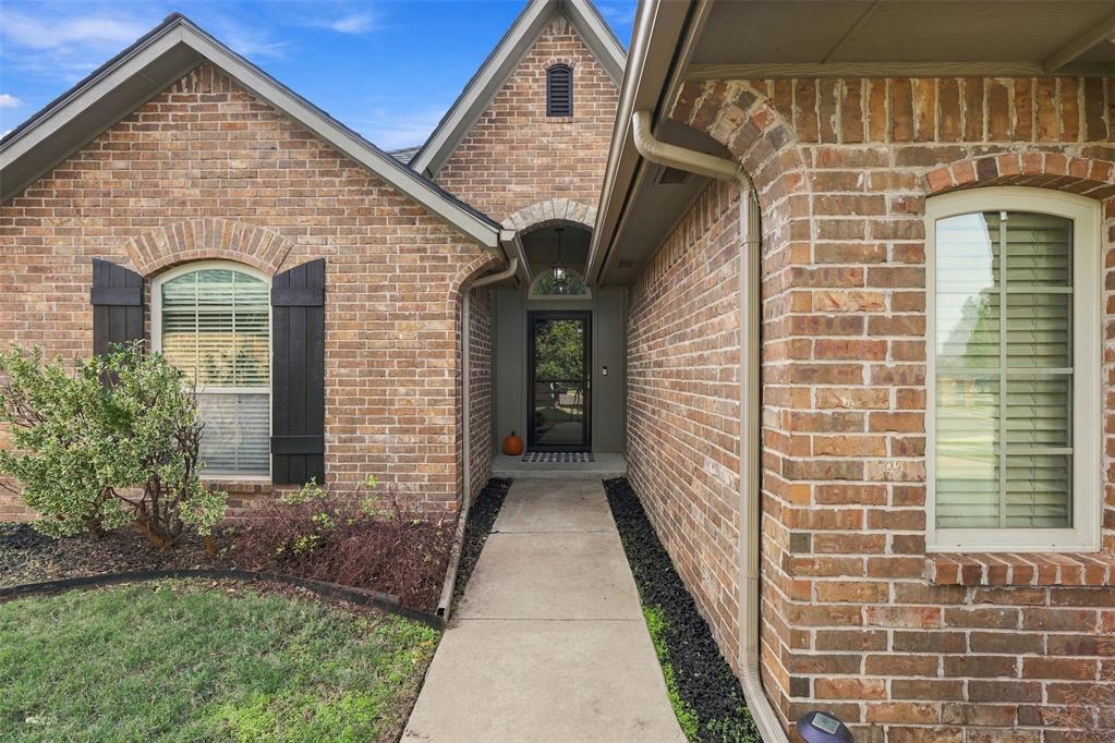 Welcome to 100 SW 173rd Street in the coveted Talavera community of Southwest Oklahoma City! This 3-bedroom, 2-bathroom home offers a spacious, open layout with vaulted ceilings, and a corner fireplace! Enjoy new carpet and fresh paint throughout! The kitchen features granite countertops, stainless steel appliances, ample cabinetry, and a breakfast bar.  The primary bathroom includes double vanities, a jetted tub, separate shower, and two closets. Enjoy the covered back patio, perfect for relaxing or entertaining. Complete with an above ground storm shelter in the 2-car garage.  Conveniently located near Arbor Gardens, easy access to I-35, Moore, Norman, shopping, dining, and so many other great everyday amenities.