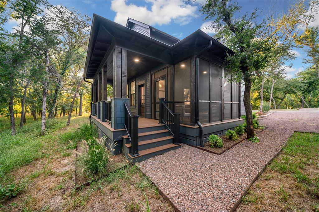 Looking for privacy, personality, and a lifestyle you can’t recreate anywhere else? This home is located on a private wooded cul-de-sac with no rear neighbors and sits in the heart of Selah, where nature, community, and everyday joy all come together. Imagine starting your mornings with coffee in the sunroom while enjoying the trees behind your home. Evenings are for gathering on the oversized covered patio, tucked into your own wooded backdrop with no homes behind you. This is the kind of setting people try to vacation to. Inside, the layout is designed for real living and real connection. The welcoming living area flows into a standout kitchen made for hosting, featuring an oversized island, high end appliances, gas built-in cooktop, quartz countertops, open shelving, and a dedicated coffee bar with built-in ice maker. The flexible 3-bedroom, 2-bath floor plan gives you options. One bedroom and a full bath downstairs create the perfect guest or in-law setup. Upstairs offers two more bedrooms and a full bath, including a custom bunk room designed to sleep multiple guests, ideal for sleepovers, visitors, or creative space. And then there’s Selah — where neighbors wave, golf carts cruise by, and life feels different in the best way. Enjoy walking and biking trails, pickleball courts, Pryor’s Pizza, a local coffee shop, vineyard, neighborhood market, areas with farm animals, and a private school, all woven into a one-of-a-kind community just minutes from Norman conveniences. This home is currently operating as a short-term rental, and furnishings may be available with an acceptable offer, offering flexible use as a primary residence, getaway, or investment opportunity.