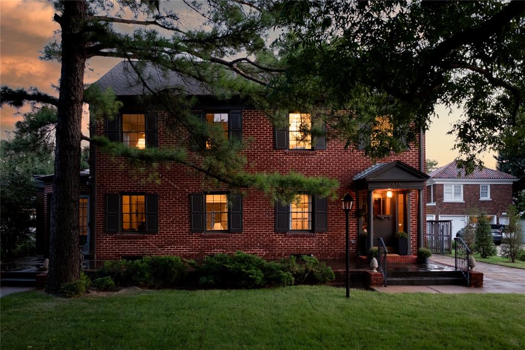 If you’ve ever dreamed of owning a timeless historic home where classical charm meets modern luxury—this is it. Built in 1930 and located in the highly sought-after Lincoln Terrace neighborhood, this brick Colonial was originally designed by renowned architects A.O. Campbell and W.E. Price, celebrated for their work on the Skirvin Tower. Today, it has been meticulously reimagined for contemporary living while honoring its architectural legacy. Nestled on a picturesque, tree-lined street just minutes from downtown OKC, the home blends history, convenience, and sophistication. Inside, every element has been thoughtfully renewed: new HVAC, fully replaced electrical and plumbing, spray-foam insulation, and all new millwork, trim, and solid-core doors throughout. The gourmet kitchen is a true centerpiece, featuring designer inset cabinetry, a 48” professional range with double oven, built-in refrigerator, full-slab marble backsplashes, and a custom plaster range surround. Perfect for entertaining, it opens seamlessly to light-filled living spaces. Two luxurious suites—including a private downstairs wing ideal for guests or multigenerational living—offer spa-inspired marble-tiled baths with  brass fixtures and details like an elegant freestanding jetted tub. Additional highlights include a masonry gas fireplace, an oak rolling library ladder, hidden laundry with custom pocket doors, and shiplap molding accents that add warmth and character. This is a rare opportunity to own a piece of Oklahoma City’s history—an exquisitely renovated architectural gem in one of the city’s most prestigious neighborhoods.