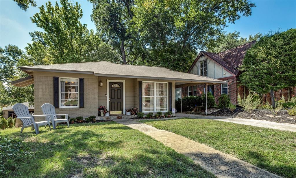 Welcome to this delightful 2 bedroom, 1 bath bungalow located in the heart of the Hollywood Santa Monica neighborhood, one of East Dallas’s most desirable districts. Inside you'll find a bright and inviting space, honeycombed with windows offering an abundance of natural light throughout. Each bedroom features custom built in cabinets that provide efficient storage solutions and blend seamlessly with the rooms’ aesthetics. The cozy, eat in kitchen is a true highlight, complete with updated granite countertops and pantry. Outside, step into a private, fenced backyard. Just beyond the fence lies a generous stretch of natural space providing a serene backdrop and a sense of openness rarely found in suburban settings, ideal for a green thumb or future expansion. The neighborhood, nestled between Lakewood Country Club and Tenison Park, is known for its rolling hills, tree lined streets, historic charm, and strong sense of community with the perfect blend of tranquility and convenience. Zoned to Lakewood Elementary School and just minutes from the scenic beauty of White Rock Lake, this home allows easy access to the amenities of Lakewood, walking and biking trails, parks, golf courses, and all the other outdoor activities Dallas has to offer.  Whether you're a first time home buyer, downsizing, or looking for a charming retreat in a vibrant neighborhood, this home is a must see.  Updates include fresh exterior paint, insulation added, electrical panel and service upgrade.