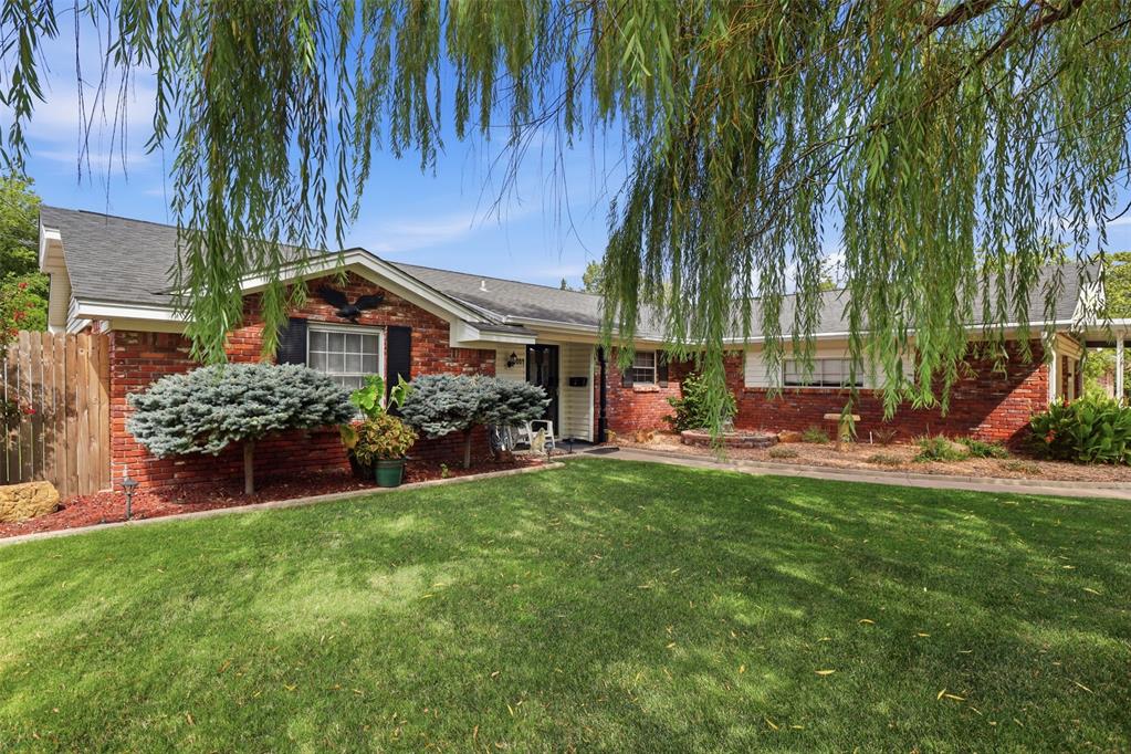 Welcome to this charming 3-bedroom, 2-bathroom home in the established Bush Hills neighborhood of Oklahoma City. This well-maintained single-story home offers a comfortable layout with a spacious living room featuring a beautiful fireplace and built-in bookcases, creating a warm and inviting space to gather. The kitchen has been remodeled and offers functionality for everyday living and entertaining. The primary bedroom includes its own full bathroom, while the additional bedrooms provide flexibility for family, guests, or a home office. Enjoy the outdoors from the open patio overlooking the fenced backyard. Additional features include a 2-car garage, a large in ground storm shelter in garage, central heat and air, and a convenient location within the Putnam City School District. This home offers a wonderful combination of comfort, character, and location—come see all it has to offer!