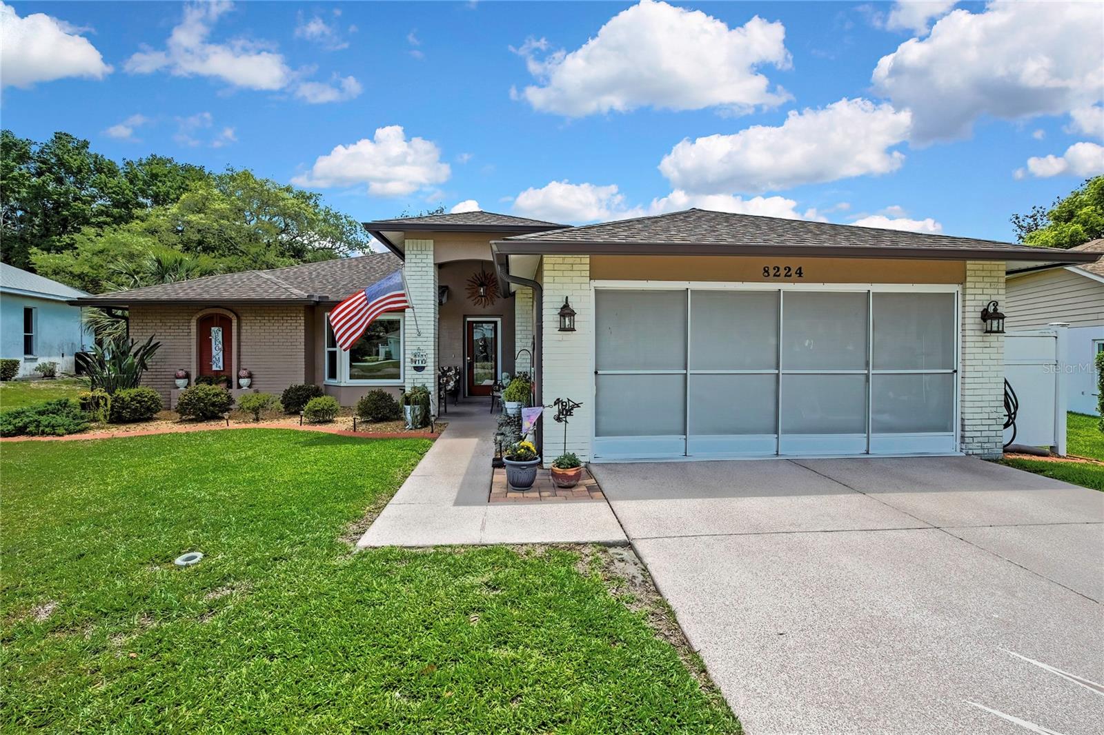 Beautifully landscaped and meticulously maintained, this stunning 2 bedroom, 2 bath, 2 car garage home in the highly sought-after 55+ community of Timber Pines offers both comfort and style with a true model-like feel from the moment you arrive. The exterior welcomes you with lush landscaping, a custom driveway with decorative curbing, and a private backyard with a wall and water retention area for added privacy.Step inside to a spacious floor plan featuring both a formal living room and a separate family room, offering flexibility for entertaining and everyday living. Engineered wood flooring runs throughout the main living areas, while soaring high ceilings highlight the family room and kitchen area, creating an open and inviting space.The beautifully updated kitchen features wood cabinetry, granite countertops, an undermount sink, tile flooring, and a cozy kitchen nook for casual dining. The kitchen opens directly to the family room, making it perfect for gatherings.The split bedroom floor plan offers privacy, with a generously sized guest bedroom that includes a large closet and a built-in desk area—perfect for a home office. The guest bathroom has been updated with a newer vanity and features a tub/shower combination.The primary suite is a true retreat, featuring dual vanities with Corian countertops, two linen cabinets for added storage, and a walk-in shower with glass doors.Additional features include an inside laundry room complete with sink, cabinetry, and a large storage closet, plus a spacious garage with pull-down attic storage. Major updates include a roof that is only 4 years old and a newer water heater. The home is also equipped with a water softener for added convenience.Step outside to your private backyard oasis featuring a patio with a charming gazebo—perfect for relaxing or entertaining.Timber Pines offers resort-style living with 4 golf courses, 2 geothermal heated pools, a multi-million-dollar fitness and wellness center, tennis and pickleball courts, a driving range, performing arts center, full-service restaurant, and countless clubs and activities. The HOA also includes cable and high-speed internet.This home truly shows like a model and is move-in ready!