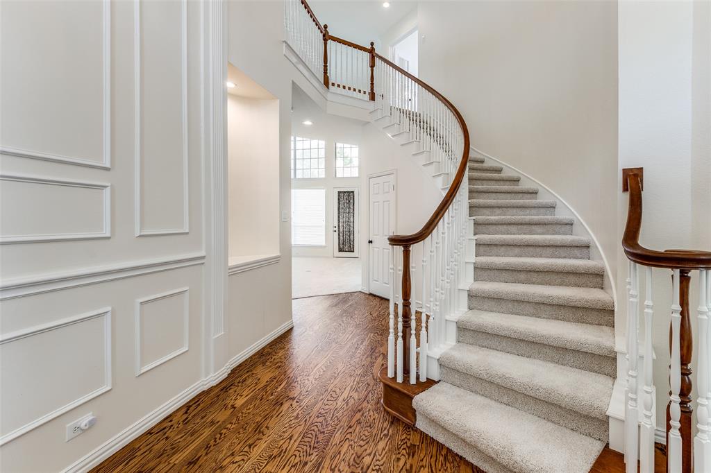 PRICED BELOW APPRAISAL!!!  Seller Motivated!!! This home is in GREAT condition.  Beautifully Updated Drees Home in One of Plano’s Top-Rated Neighborhoods in Frisco ISD. Step into this stunning, freshly updated home featuring a grand entrance with a winding staircase and a striking new chandelier. Newly refinished hardwood floors grace the entry, formal living and dining areas, and the downstairs primary suite. The spacious family room boasts soaring ceilings and custom built-ins, perfect for relaxing or entertaining. The open, updated kitchen is a chef’s dream with quartz countertops, a stylish backsplash, tile flooring, and crisp white cabinetry. The adjoining breakfast room includes built-in storage and updated lighting for a bright, modern feel. Upstairs, enjoy a large game room and dedicated media room, plus a bedroom with a private bath and two additional bedrooms connected by a Jack-and-Jill bath—ideal for family and guests.  Full 3 car garage.  Fresh paint throughout, new hardware on all doors, lighting and brand-new carpet make this home truly move-in ready. The backyard offers ample space for outdoor enjoyment, and you're just a short walk from a serene 5-acre park and the expansive 150-acre Russell Creek Park.  Additional updates include a new roof (2023) and updated HVAC system. Conveniently located near top-rated schools, shopping, dining, and Hwy 121, this home offers comfort, style, and an unbeatable location. If Buyer prefers a gas cooktop there is a gas line that can be brought in directly from garage .