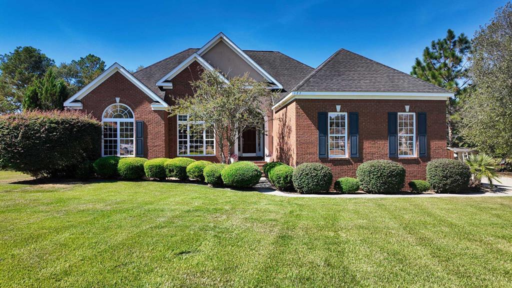 Welcome to 127 Lost Creek Lane in the desirable Heards Pond subdivision—just minutes from Thomasville, yet offering all the peace and privacy of country living. This nearly 1,800 sq. ft. home sits on a full acre lot and combines elegant design with backyard resort living. Step inside and you'll immediately notice the soaring 12-foot ceilings that create a sense of openness throughout the home. The kitchen is designed with both beauty and function in mind, featuring granite countertops and plenty of space for cooking and entertaining. The master suite is a true retreat, with a large bedroom and private sitting area, an oversized walk-in closet, and a spa-inspired bath. Two additional bedrooms and another full bathroom provide comfortable accommodations for family or guests. The backyard is where this property truly shines. Overlooking the neighborhood-maintained pond, the fenced yard feels like a private oasis. Spend your days relaxing in the resort-style gunite saltwater pool, complete with a built-in hot tub and a brand-new heater. A screened porch and grilling deck make it easy to enjoy evenings outside, whether entertaining friends or unwinding with family. Set in the established Heards Pond community, this home offers both lifestyle and location—just minutes from shopping, dining, and all that Thomasville has to offer. 127 Lost Creek Lane is more than a home—it's a retreat designed for comfort, style, and everyday enjoyment.