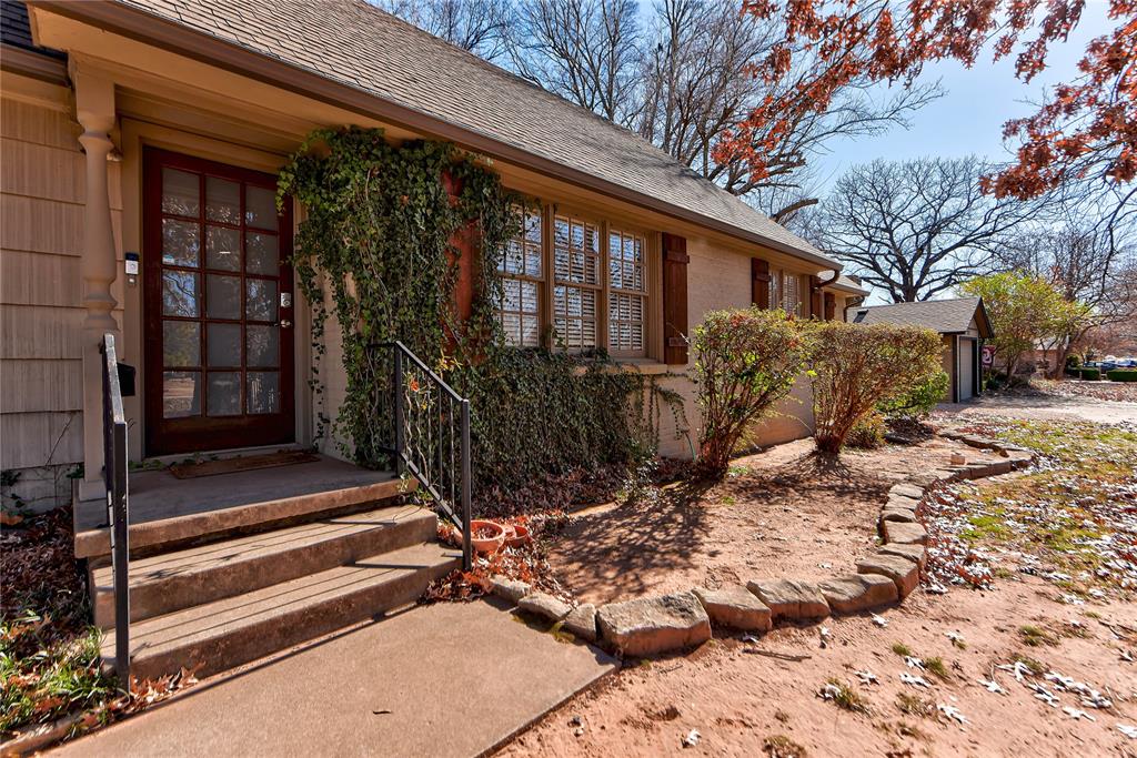 This cute campus-area bungalow is full of charm and perfectly located within walking distance to the University of Oklahoma. Featuring darling shutters and thoughtful updates throughout, the home offers an open-concept floor plan with four bedrooms and two baths, making it both functional and inviting. Warm, real wood floors, light and bright paint, crown molding, and an abundance of windows create a cheerful, welcoming atmosphere. The updated kitchen showcases granite countertops and stainless steel appliances, while French doors lead to a brand-new back patio complete with a porch swing—ideal for relaxing or entertaining. The garage has been converted into a private fourth bedroom with its own mini-split, adding flexibility and value. Additional highlights include an interior washer and dryer, a large backyard, and excellent natural light throughout. The home is currently leased through mid-May 2026, making it a great investment opportunity in a prime campus location.