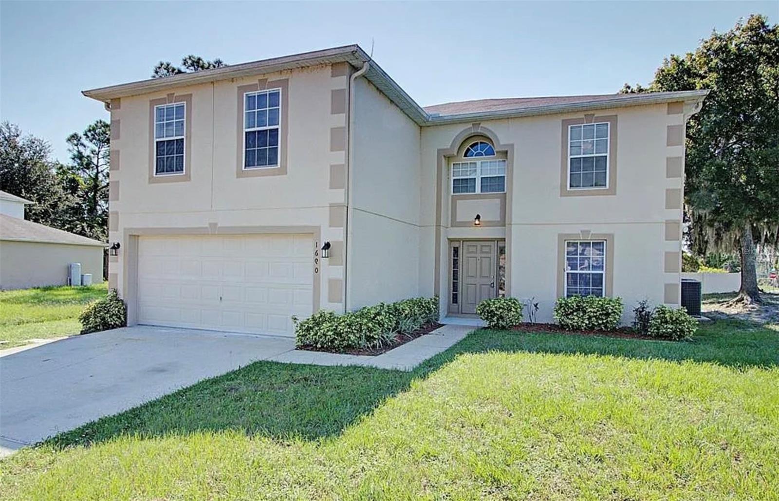 This well-maintained 4-bedroom, 2.5-bath home offers over 2500 sq. ft. of living space designed for comfort and flexibility. Featuring multiple living areas, a large well appointed kitchen, and spacious bedrooms, this property is ideal for extended families or as an investment opportunity. The layout supports both private and shared spaces with accessibility in mind. Located on a spacious corner lot, you will enjoy the large backyard, ample parking, and a prime location close to shopping, transportation, and healthcare services. Centrally located to the many perks of central Florida, you will love the quick access to I-4, placing you within 30 minutes of historic downtown DeLand and Sanford, the beautiful beaches of Volusia County, the Orlando Sanford airport and the vibrant city of Orlando.