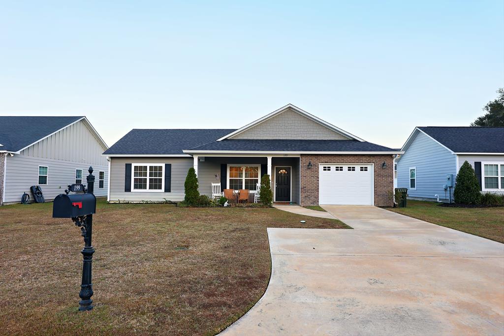 SPECTACULAR HOME all the way around from price, square footage and finishes!  This one story home affords many options for various buyers whether you are a first time home buyer, couple starting a family or a retiree that enjoys a one story home. The living area is open with a split bedroom floorplan which allows for privacy and the primary bedroom is oversized.  There is even a sitting area and the walk in closet is large with an abundance of storage.  Minutes from city limits which means COUNTY TAXES ONLY and convenient location.  Home is located on a cul-de-sac which is a plus and the HOA takes care of lawn maintenance.  Call or text your agent of choice to view this beautiful home and get ready to enjoy this rocking chair front porch!