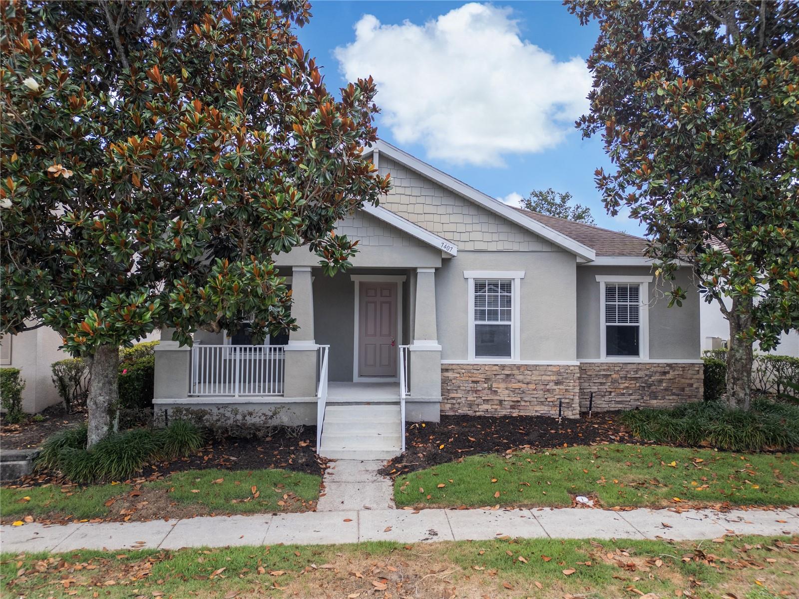 One or more photo(s) has been virtually staged. 7407 Devereaux St offers something increasingly hard to find in Central Florida: a home where much of the maintenance is already handled for you. Located behind the 24-hour guarded gates of Reunion, the HOA includes internet, cable TV, lawn mowing, edging, fertilization, and even scheduled tree trimming - meaning fewer vendors to coordinate, fewer bills to manage, and more time to enjoy where you live. Whether you’re looking for a primary residence, vacation home, short-term rental, or long-term investment, this community in Reunion offers the flexibility to fit your goals. When it’s time to leave the community, you’re minutes from ChampionsGate’s restaurants, Publix, Target, Starbucks, and everyday conveniences. Want dinner out? Head to Ford’s Garage for burgers, Trevi’s at Omni Orlando Resort for Italian, or grab drinks with friends without venturing far from home. Disney, Disney Springs, golf courses, water parks, and some of Central Florida’s most visited destinations are all within easy reach, while home remains tucked behind one of the area’s most recognizable gated communities. Enjoy! *Some marketing images have been AI-assisted and virtually staged to illustrate the property’s potential layout, design, use of space, and possible aesthetic enhancements. Certain photos may include digitally enhanced visualization of furnishings, décor, finishes, landscaping, or cosmetic elements for marketing and illustrative purposes only. Actual property conditions, features, finishes, fixtures, and appearance may vary, and buyers are encouraged to independently inspect the property to verify all present conditions.*