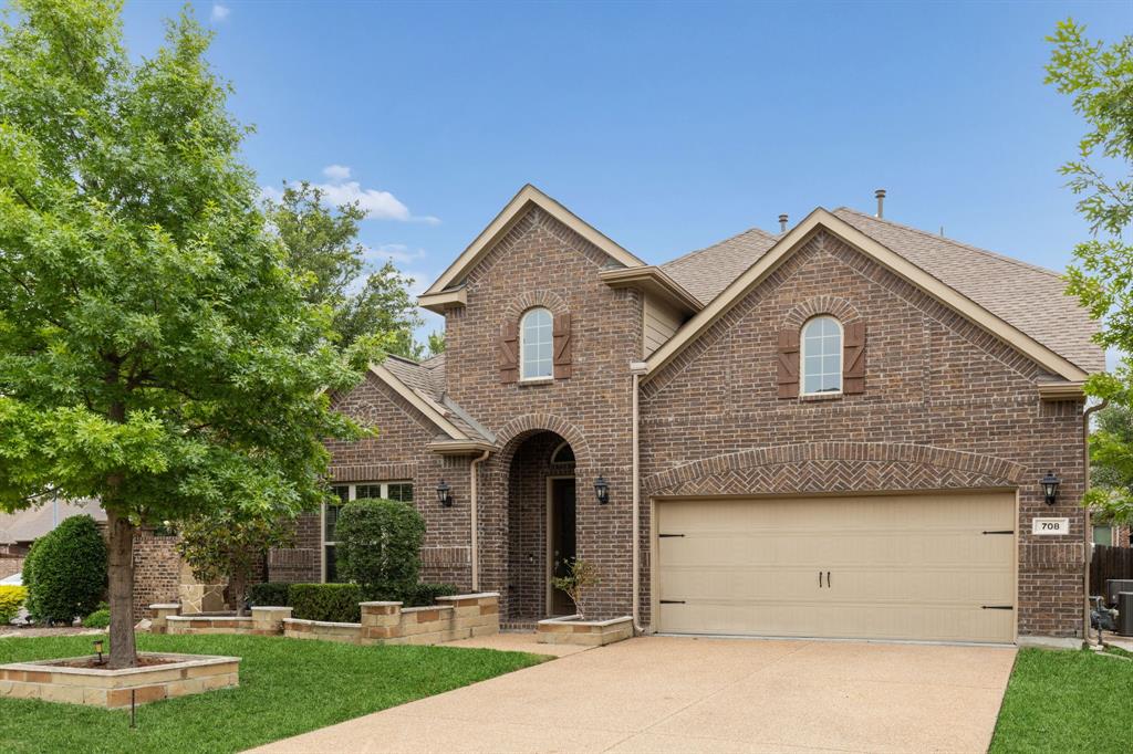 Experience refined comfort and modern design in this beautifully maintained 4-bedroom, 3.5-bath residence offering 3,217 square feet of thoughtfully designed living space, built in 2018. Situated in a highly desirable Plano location, this home delivers a versatile and functional floorplan ideal for today’s lifestyle, with seamless flow between living, dining, and entertainment areas. The heart of the home is a gourmet kitchen featuring an oversized island, gas cooktop, double ovens, abundant cabinetry, and generous prep space, all opening to a light-filled living area anchored by a cozy fireplace. This open-concept layout enhances both daily living and entertaining, while maintaining a sense of comfort and connectivity throughout. The primary suite offers a spacious retreat with a well-appointed ensuite bath and walk-in closet, providing both comfort and functionality. Upstairs, additional bedrooms are complemented by two full baths, along with a dedicated game room and a private media room with upgraded walls creating a true theater-like experience. Recent updates and enhancements elevate the property’s appeal, including a whole-home water purification system, extended back patio with seating capacity for eight, and professionally added flower beds in both front and backyard spaces. The outdoor living area offers a relaxing setting for gatherings or quiet evenings. The garage features an EV charging port, epoxy flooring and additional overhead storage, maximizing organization and usability. Additional highlights include a large utility room, ample storage throughout, and a low-maintenance backyard. Refrigerator can convey with the property. Conveniently located near major thoroughfares, shopping, dining, and everyday conveniences, this home combines comfort, style, and accessibility in one exceptional offering. Schedule your private tour today to experience all this home has to offer.