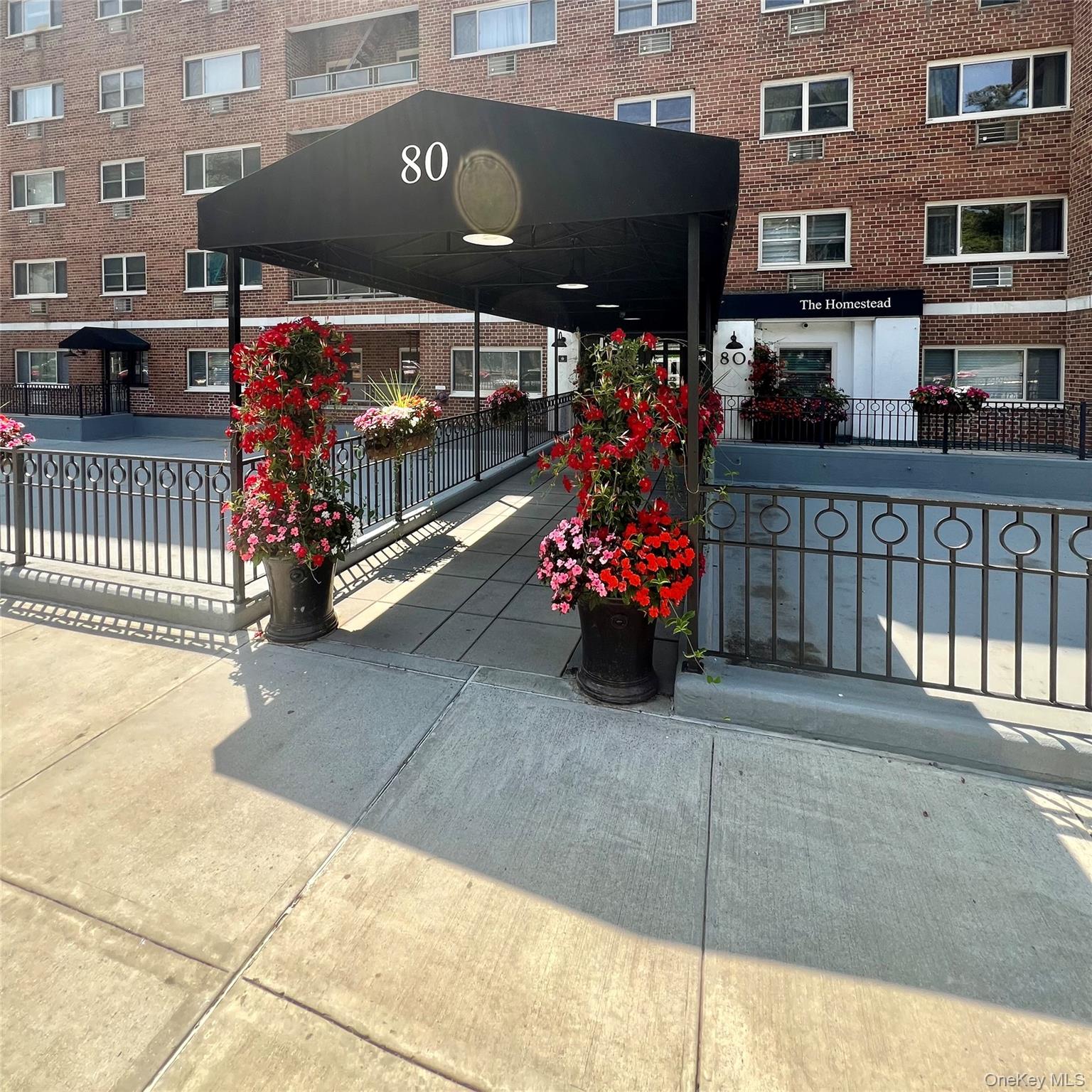 Looking for a blend of quiet, location, restaurants, shopping, Fitness facilities, close to train, transportation and major Highways? Look no more, this sun filled end unit offers two generously sized bedrooms, hardwood floors throughout, full bath, a spacious bright living room with expansive window overlooking the gorgeous grounds, an updated kitchen with granite counter and glass tile backsplash with access to the sun filled dining room. Laundry is on each floor! The building is going through so many upgrades, mailing room, receiving room, lobby etc. This is a gem you do not want to miss !!!