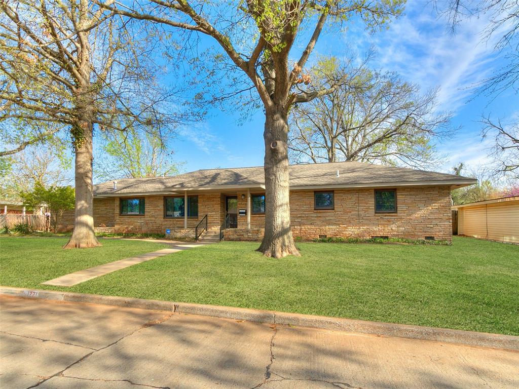 Hello, Convenience and Character!
This retro campus gem is full of personality, comfort, and thoughtful updates. Built in 1953, this Mid-Century Modern home blends timeless vintage charm with modern functionality—just steps from the campus bike trail and less than a mile from the University of Oklahoma.

Inside, you’ll find over 2,400 square feet of stylish living space with 3 spacious bedrooms, 2 bathrooms, and multiple living areas perfect for relaxing, working, or entertaining. From curated retro finishes to smart updates throughout, this home has been lovingly maintained with an eye for design.

Enjoy the convenience of a two-car garage plus a covered carport, and step out back to one of the true highlights—an oversized 0.4-acre backyard. Whether you're hosting a game-day get-together, gardening, or simply soaking up the Oklahoma sunshine, there's room to do it all.

Whether you're looking for your own Norman retreat, a stylish student home, or a unique short-term rental opportunity, 1221 Cruce Street checks all the boxes in a location that can’t be beat.

Updates : 
Custom-built drawers throughout the entire home (2025)
Upgraded cabinet doors in the main bathroom (2025)
Upgraded roof on the garage and carport (2025)
New WiFi-enabled sprinkler system (2021)
New side fence between properties (2022)
Fresh exterior paint (2021)
New gutters (2021)
New dishwasher (2023)
Garbage disposal installation (2021)
Leveled backyard and arborist-managed tree trimming (2021)